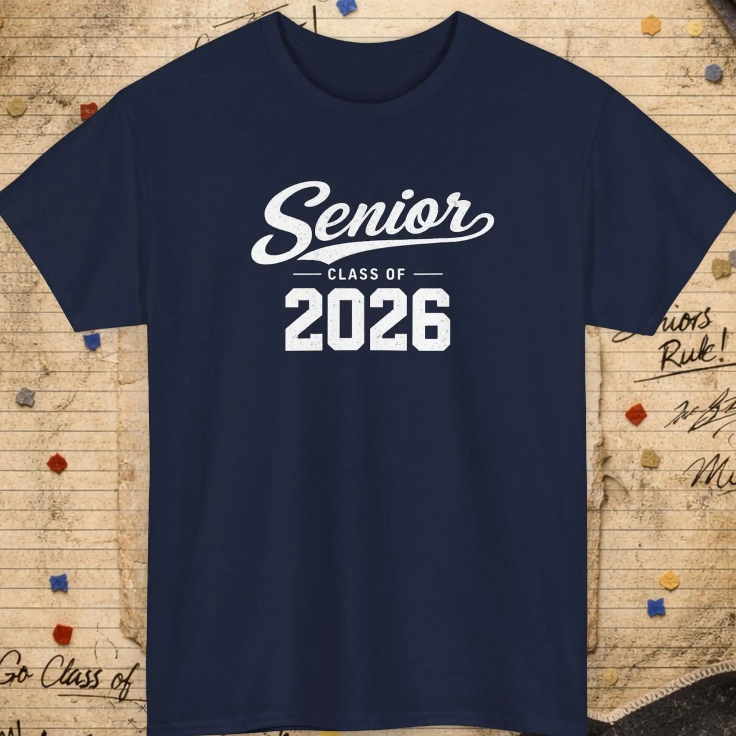 Navy blue t-shirt with 'Senior Class of 2026' text on a textured background with confetti and signatures.