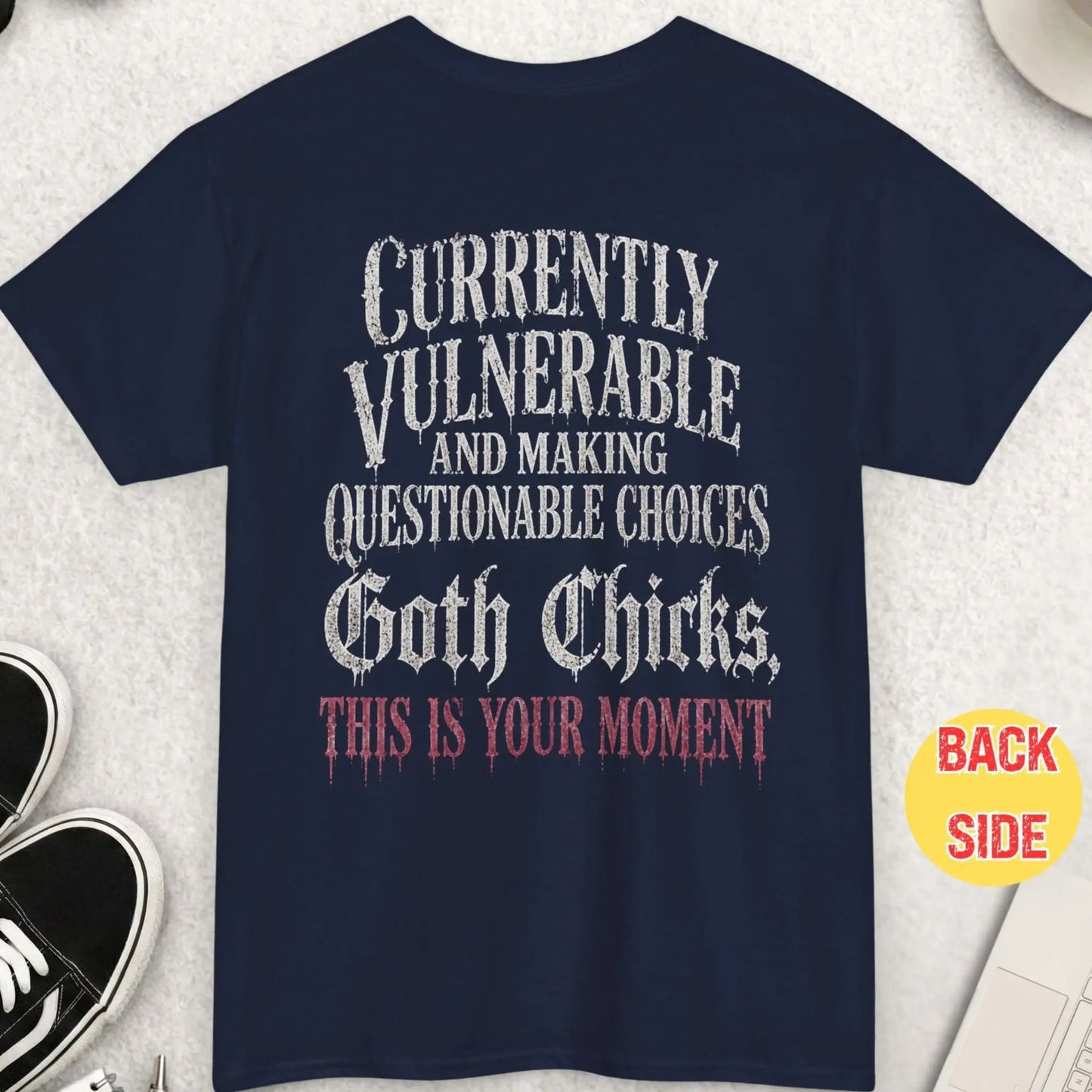 Navy blue t-shirt with gothic-style dripping text stating “Currently Vulnerable and Making Questionable Choices Goth Chicks This Is Your Moment” in a distressed vintage aesthetic.