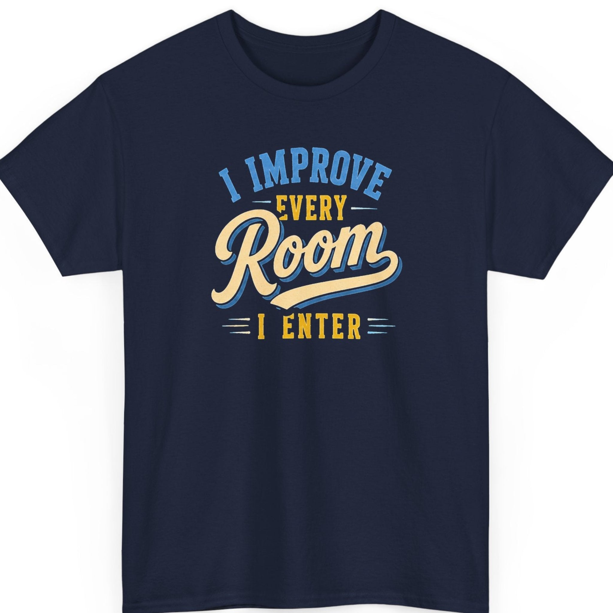 Mayhem Haus statement tee on a navy blue shirt featuring retro-inspired blue, cream, and gold lettering displaying the phrase "I Improve Every Room I Enter."