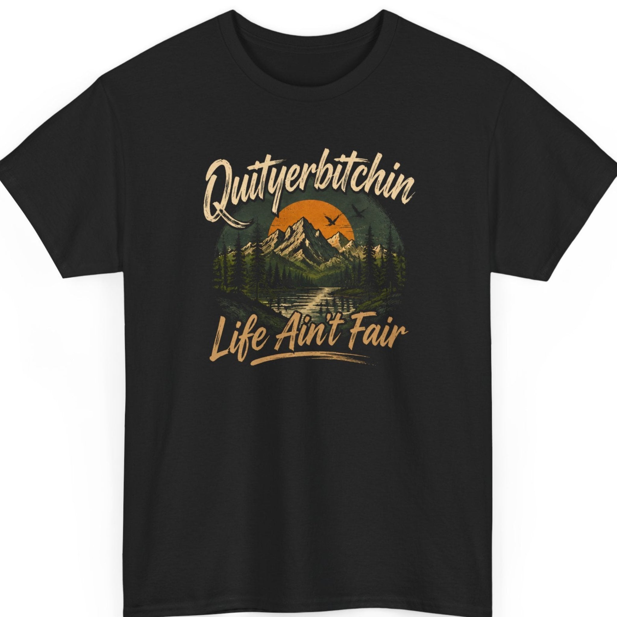 mayhem haus black outdoor graphic t-shirt featuring a vintage mountain landscape with the sarcastic quote "Quityerbitchin' Life Ain't Fair" in distressed lettering.