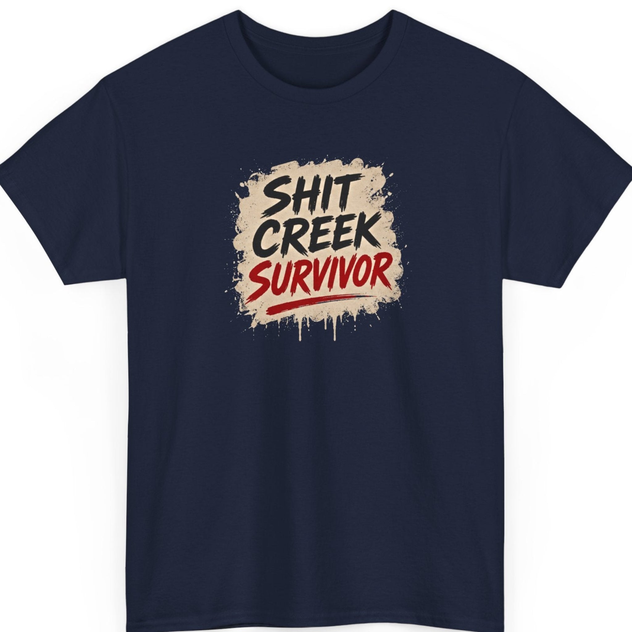 Mayhem Haus sarcastic typography tee on a navy blue shirt displaying "Shit Creek Survivor" in distressed black and red brush lettering over a weathered beige paint splash.