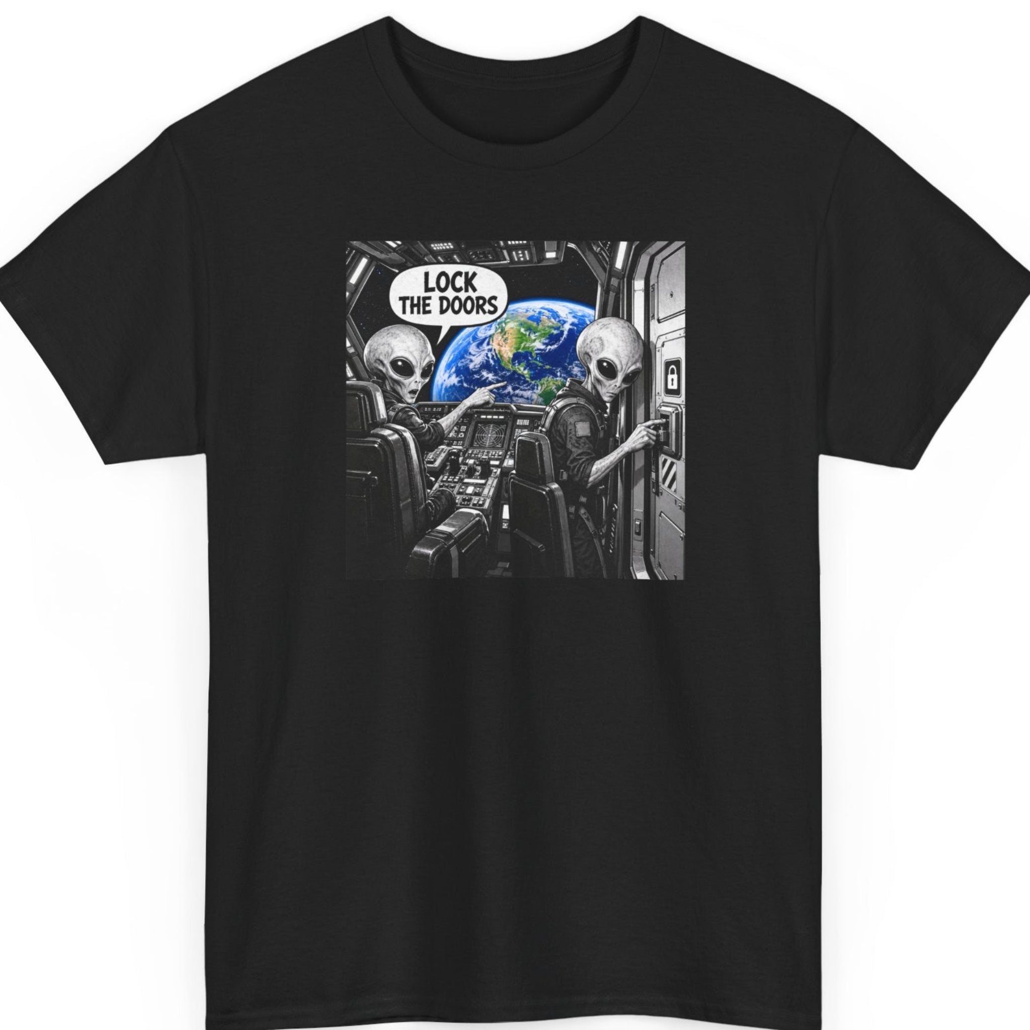 Mayhem Haus “Lock the Doors” black t-shirt featuring two grey aliens inside a spaceship cockpit, one pointing toward Earth while the other locks the spacecraft door, with a comic-style speech bubble reading “Lock the Doors.”