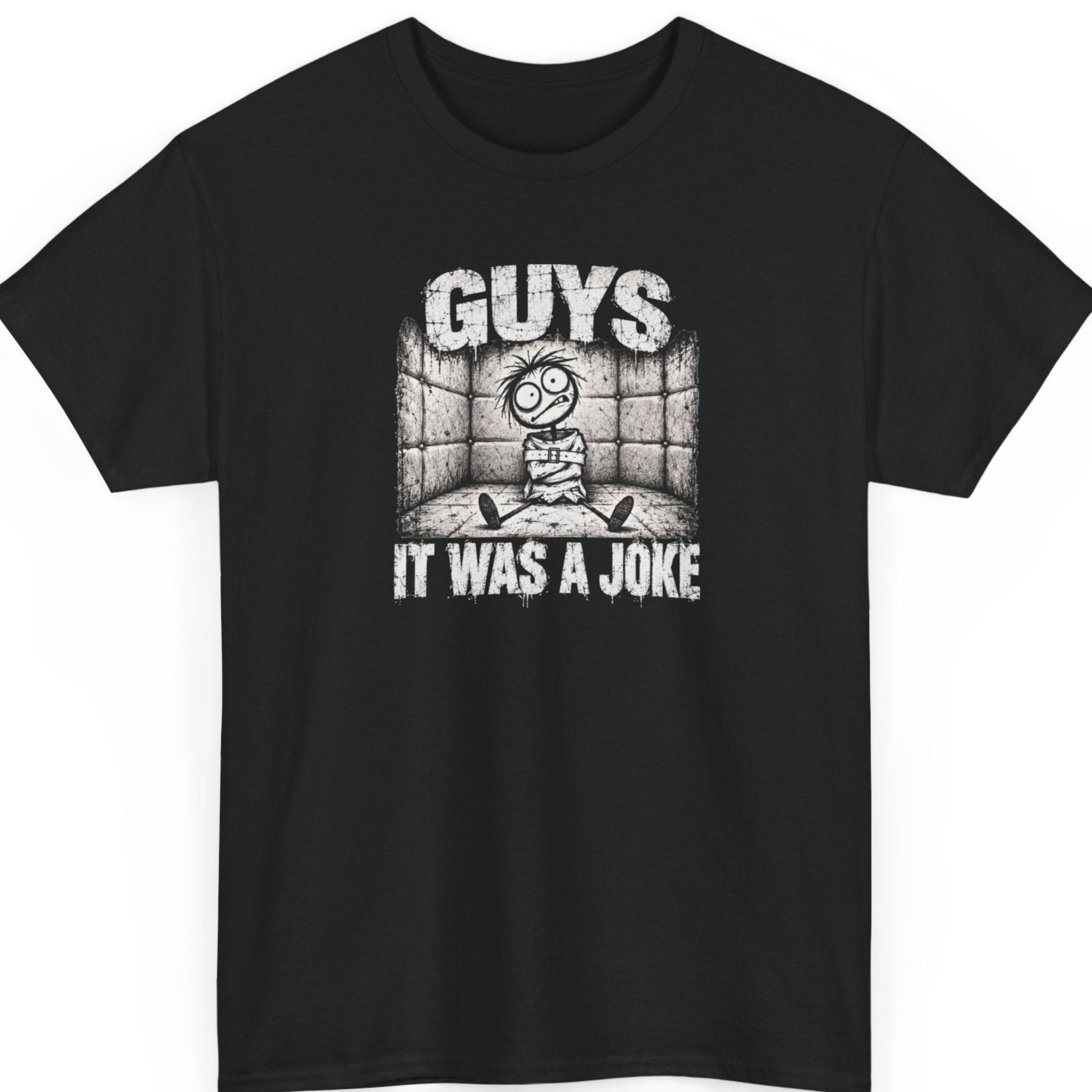 Mayhem Haus “Guys It Was a Joke” black t-shirt featuring a distressed black-and-white illustration of a wide-eyed stick figure wearing a straitjacket inside a padded room, framed by bold weathered white lettering.