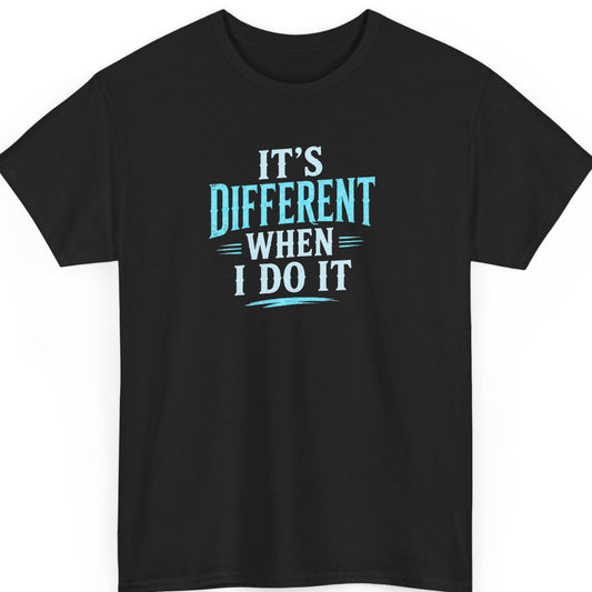 Mayhem Haus "It's Different When I Do It" graphic t-shirt on a black shirt featuring distressed white and blue typography in a bold stacked minimalist design.