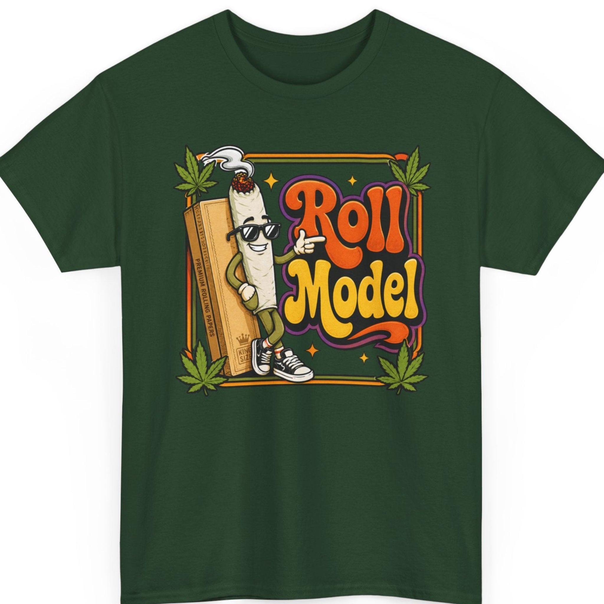 Mayhem Haus cannabis shirt on a forest green shirt featuring a cartoon joint character pointing beside bold "Roll Model" lettering with rolling papers and marijuana leaves.