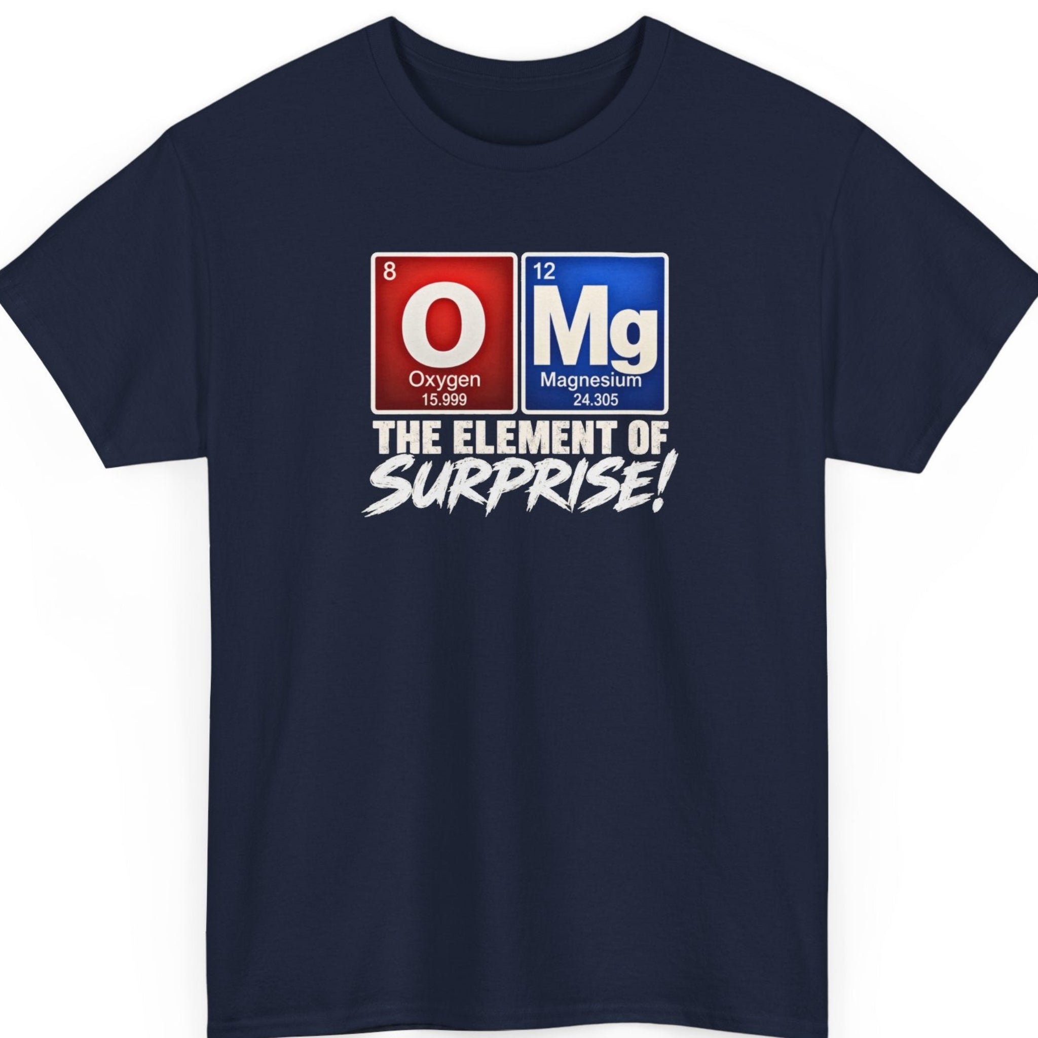 Mayhem Haus “OMG The Element of Surprise!” navy blue t-shirt featuring colorful periodic table tiles for Oxygen and Magnesium, forming the chemistry joke OMG above the phrase “The Element of Surprise!” in white typography.