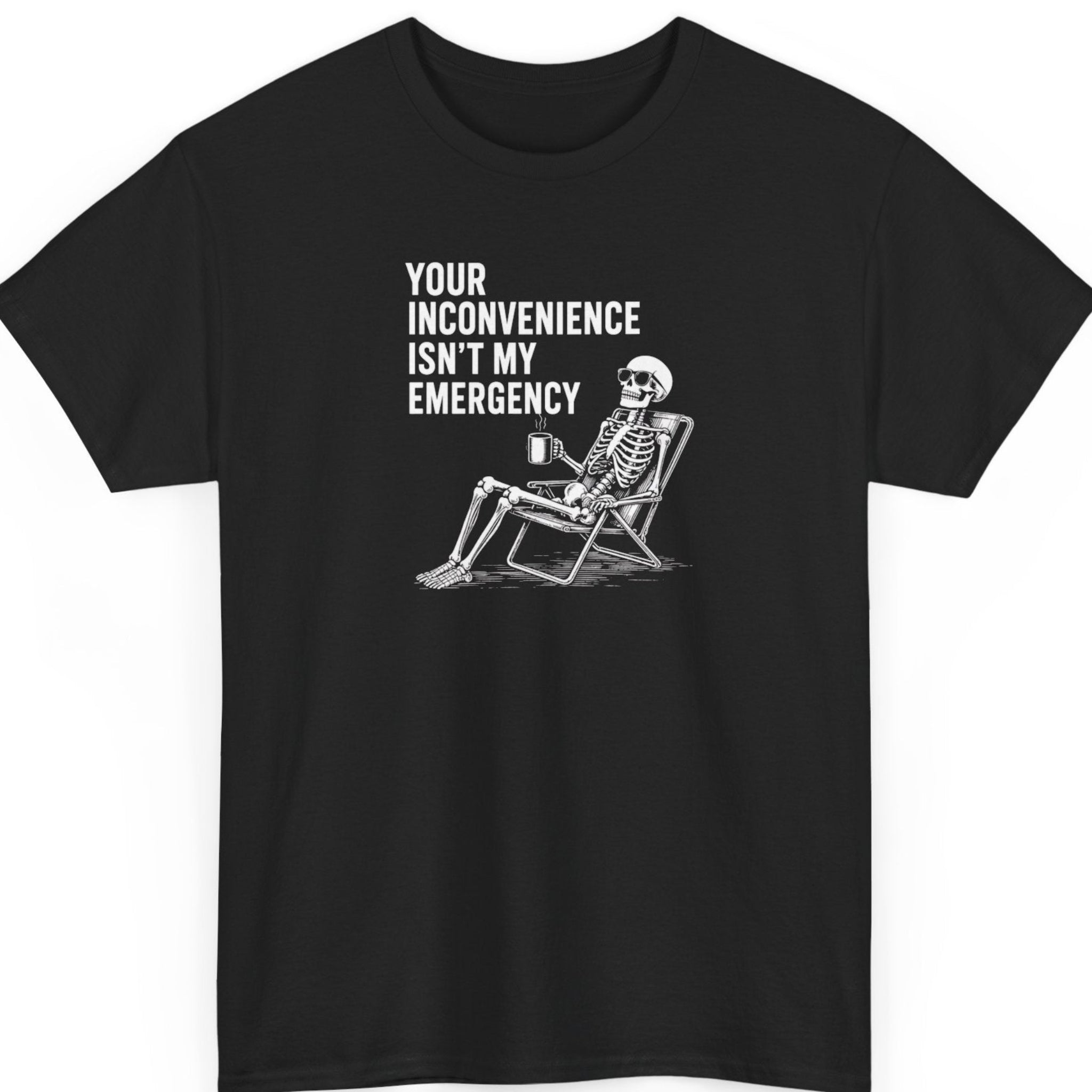 Mayhem Haus "Your Inconvenience Isn't My Emergency" graphic t-shirt on a black shirt featuring distressed white typography alongside a relaxed skeleton sitting in a folding chair holding a coffee mug.