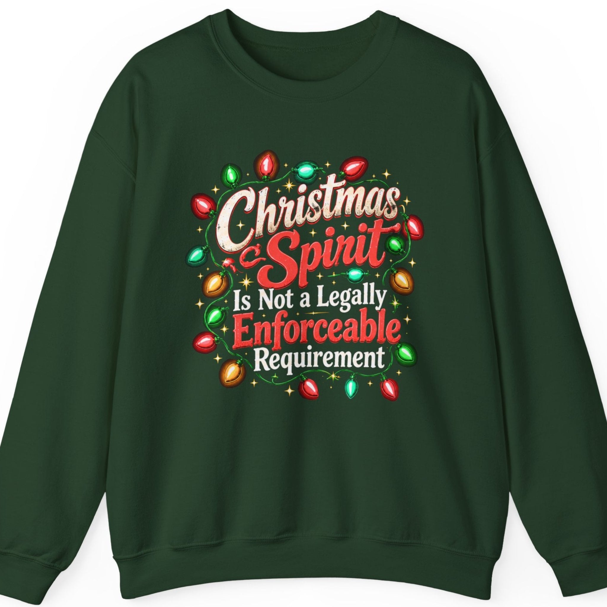 Mayhem Haus “Christmas Spirit Is Not a Legally Enforceable Requirement” forest green crewneck sweatshirt featuring distressed cream-white and red vintage Christmas typography surrounded by glowing red, green, and gold holiday string lights, decorative golden stars, and ornamental green flourishes.