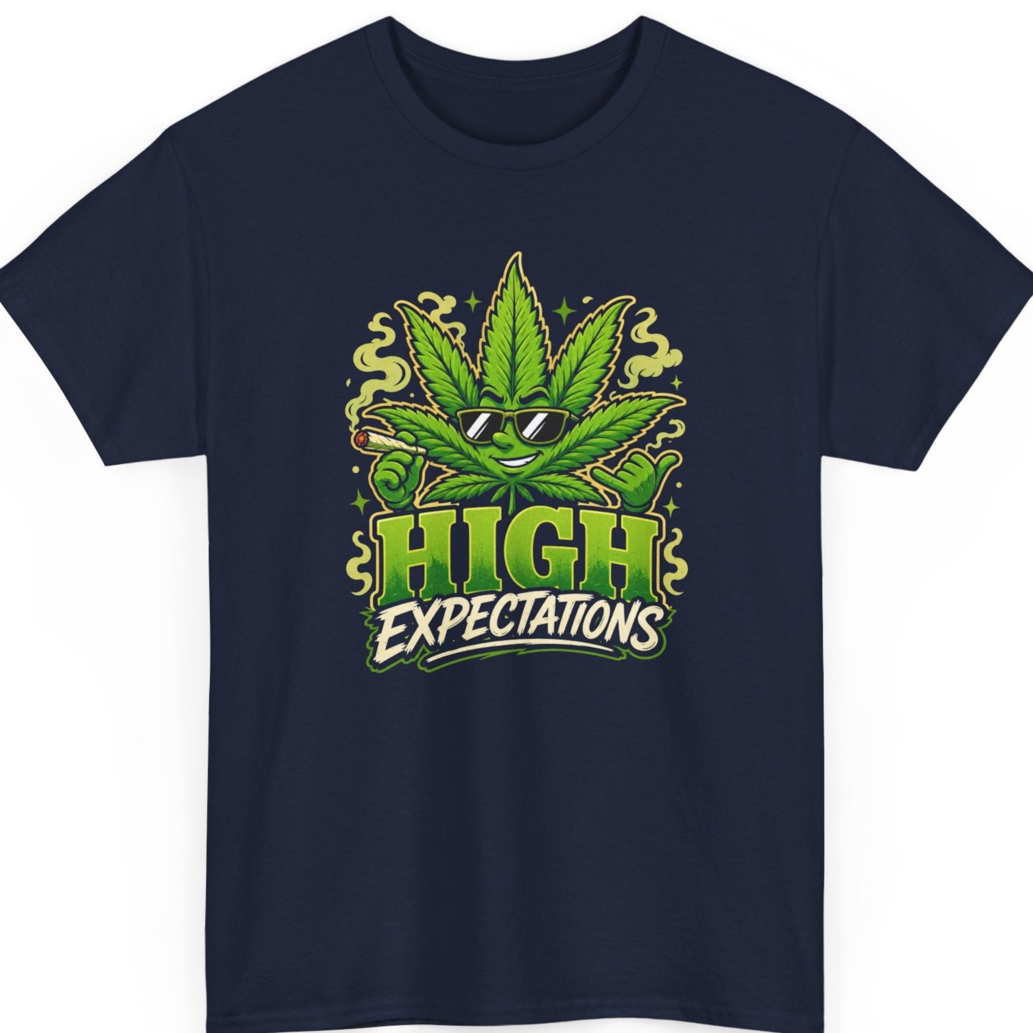 Mayhem Haus weed graphic tee on a navy blue shirt featuring a smiling cannabis leaf mascot with sunglasses, a smoking joint, swirling smoke, and bold "High Expectations" lettering.