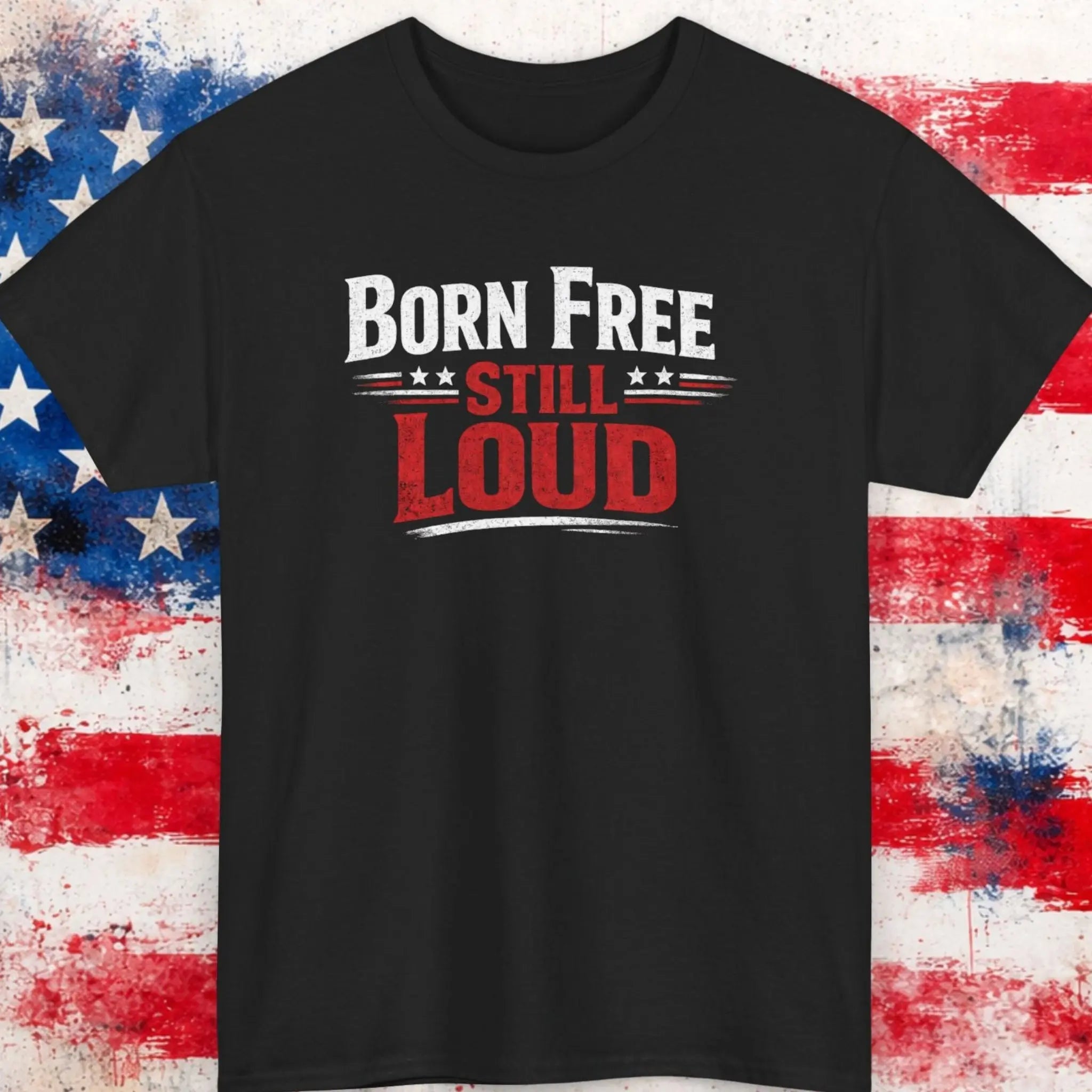 Mayhem Haus Born Free Still Loud T-Shirt in black with white and red text on an American flag background