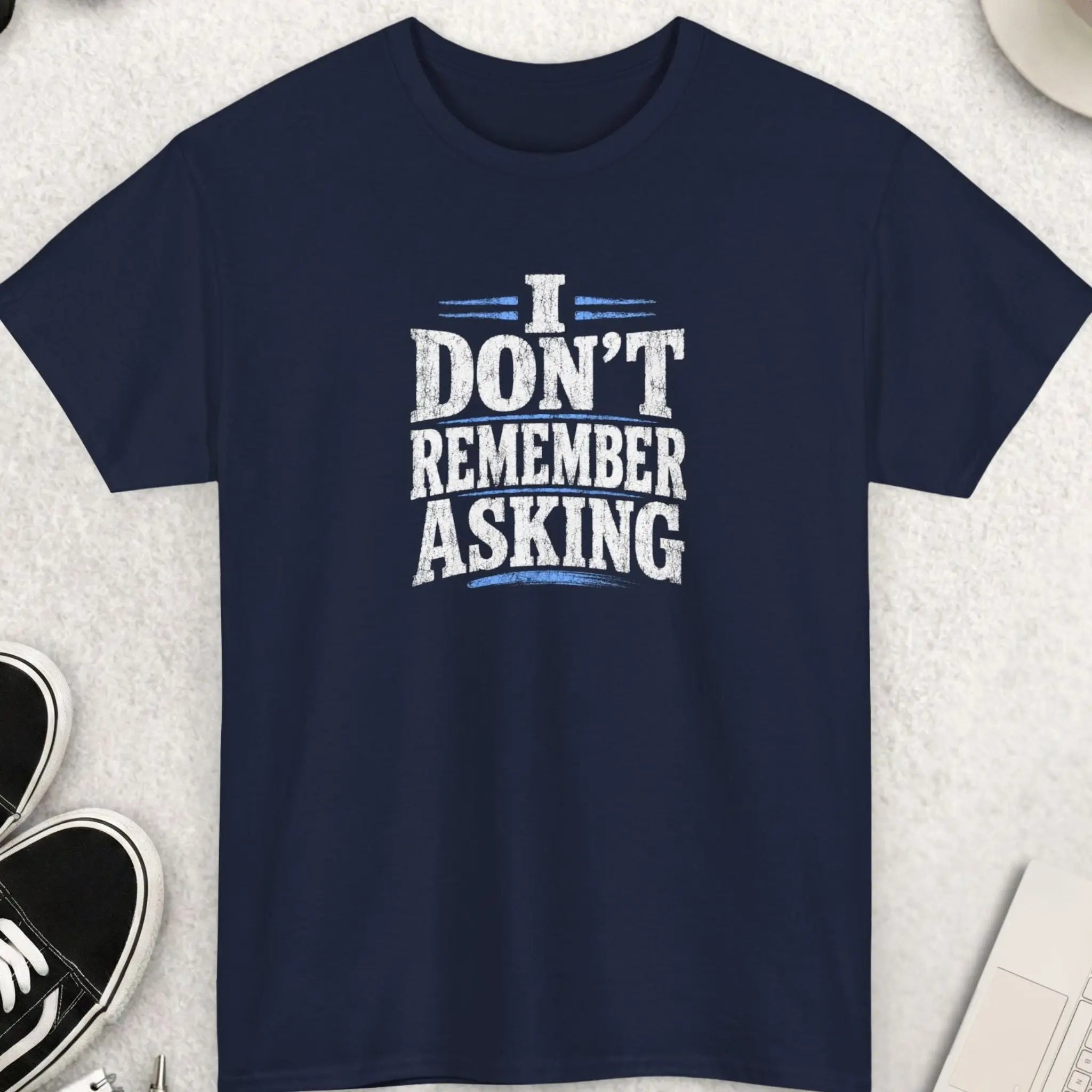 Navy blue sarcastic graphic tee with distressed white lettering reading “I Don’t Remember Asking” accented with red grunge details in a bold alternative streetwear style by Mayhem Haus.