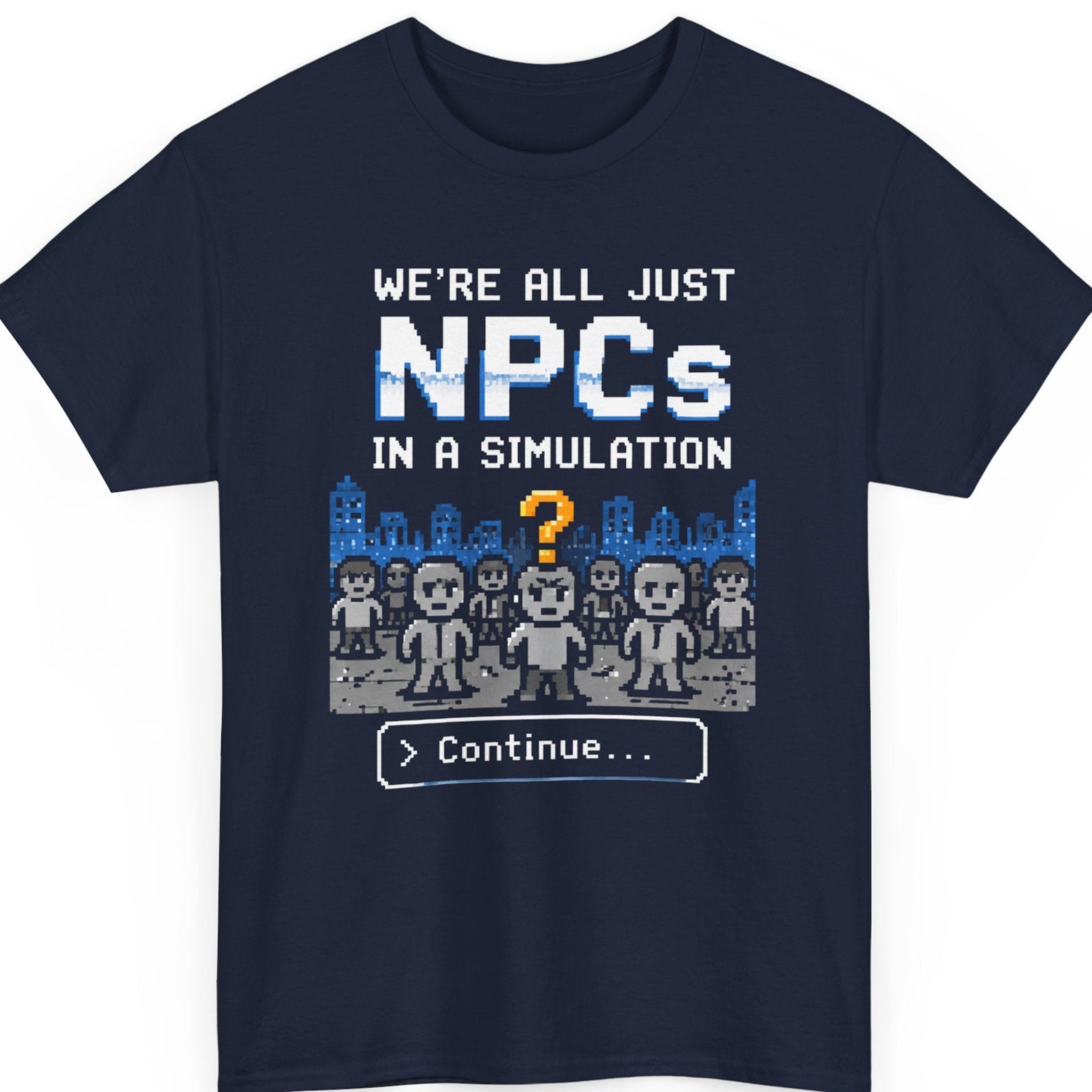 Mayhem Haus pixel art graphic tee on a navy blue shirt featuring retro 8-bit NPC characters, city skyline, and the phrase "We're All Just NPCs In A Simulation" with a classic Continue prompt.