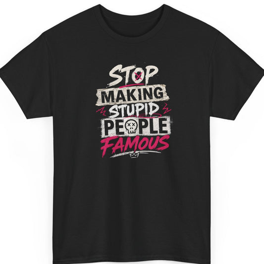 Mayhem Haus sarcastic graphic t-shirt on a black shirt featuring distressed white and hot pink typography reading "Stop Making Stupid People Famous" with a skull icon and grunge accents.