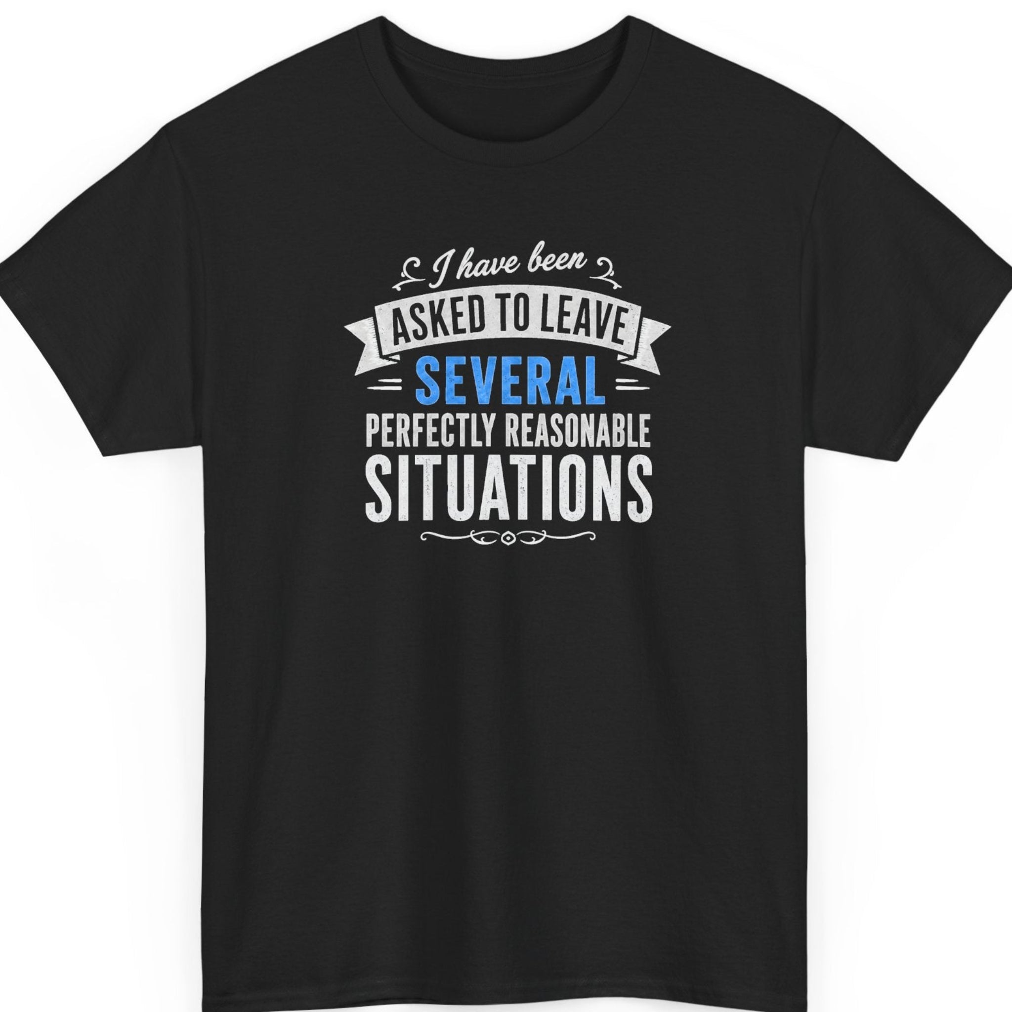 Mayhem Haus deadpan surrealism t-shirt on a black shirt featuring a stacked distressed typography design that reads, “I Have Been Asked to Leave Several Perfectly Reasonable Situations,” with the word “Several” highlighted in blue.