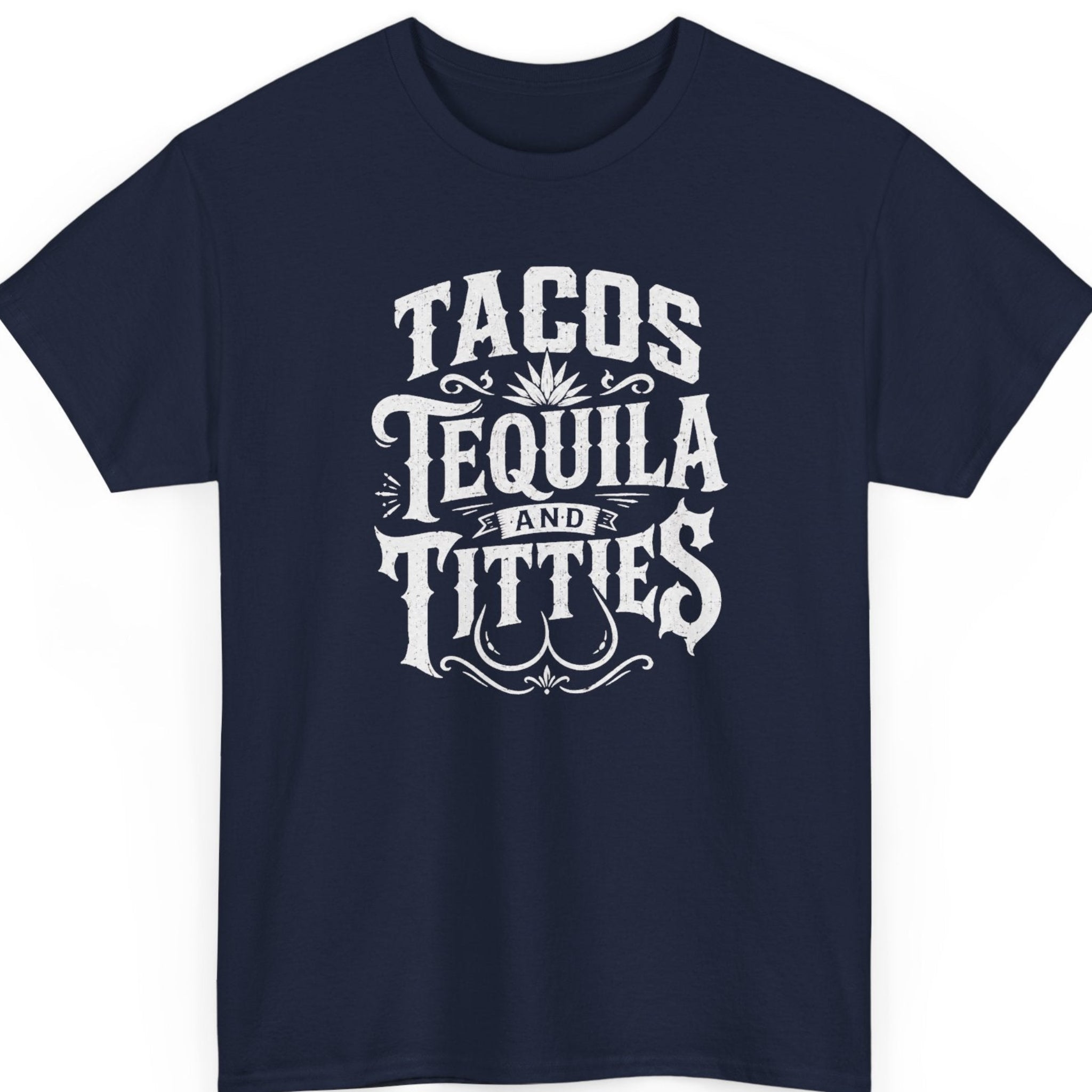 Mayhem Haus party humor t-shirt on a navy blue tee featuring bold vintage-inspired lettering and a playful adult-themed design built around the phrase, “Tacos, Tequila and Titties.”