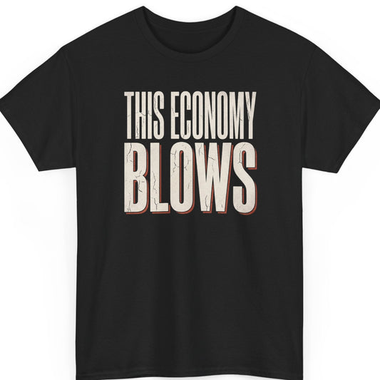Mayhem Haus "This Economy Blows" graphic t-shirt on a black shirt featuring distressed cream typography with subtle vintage red shadow accents in a bold stacked design.