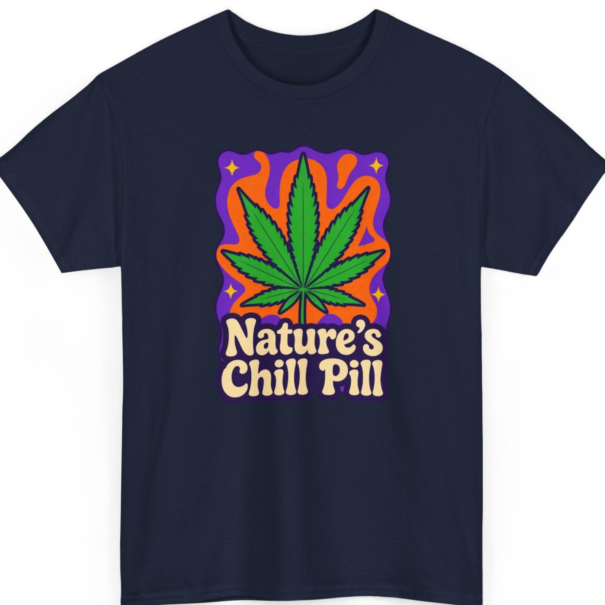 Mayhem Haus weed graphic tee on a navy blue shirt featuring a colorful psychedelic cannabis leaf illustration with the phrase "Nature's Chill Pill" in retro bubble typography.