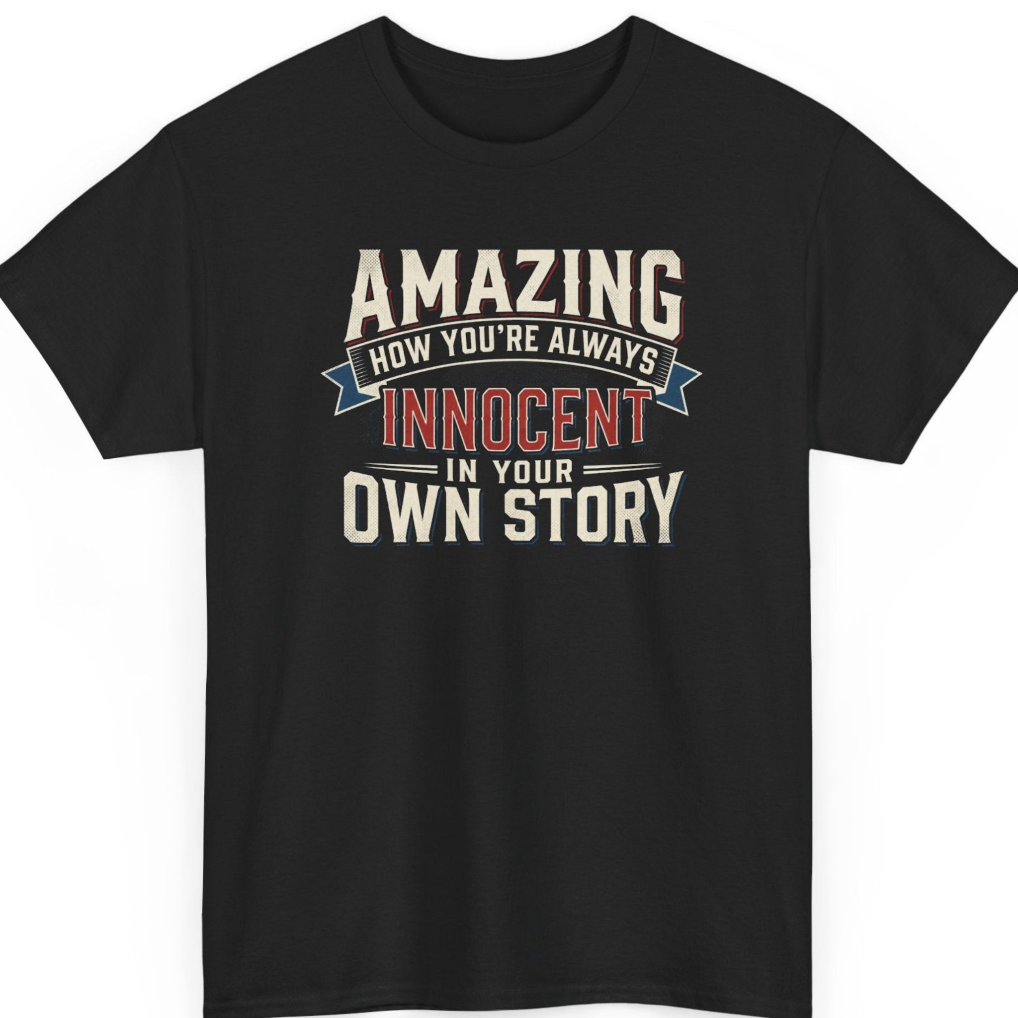 Mayhem Haus "Amazing How You're Always Innocent In Your Own Story" typography t-shirt on a black shirt featuring distressed cream, red, and blue vintage lettering in a bold stacked layout.