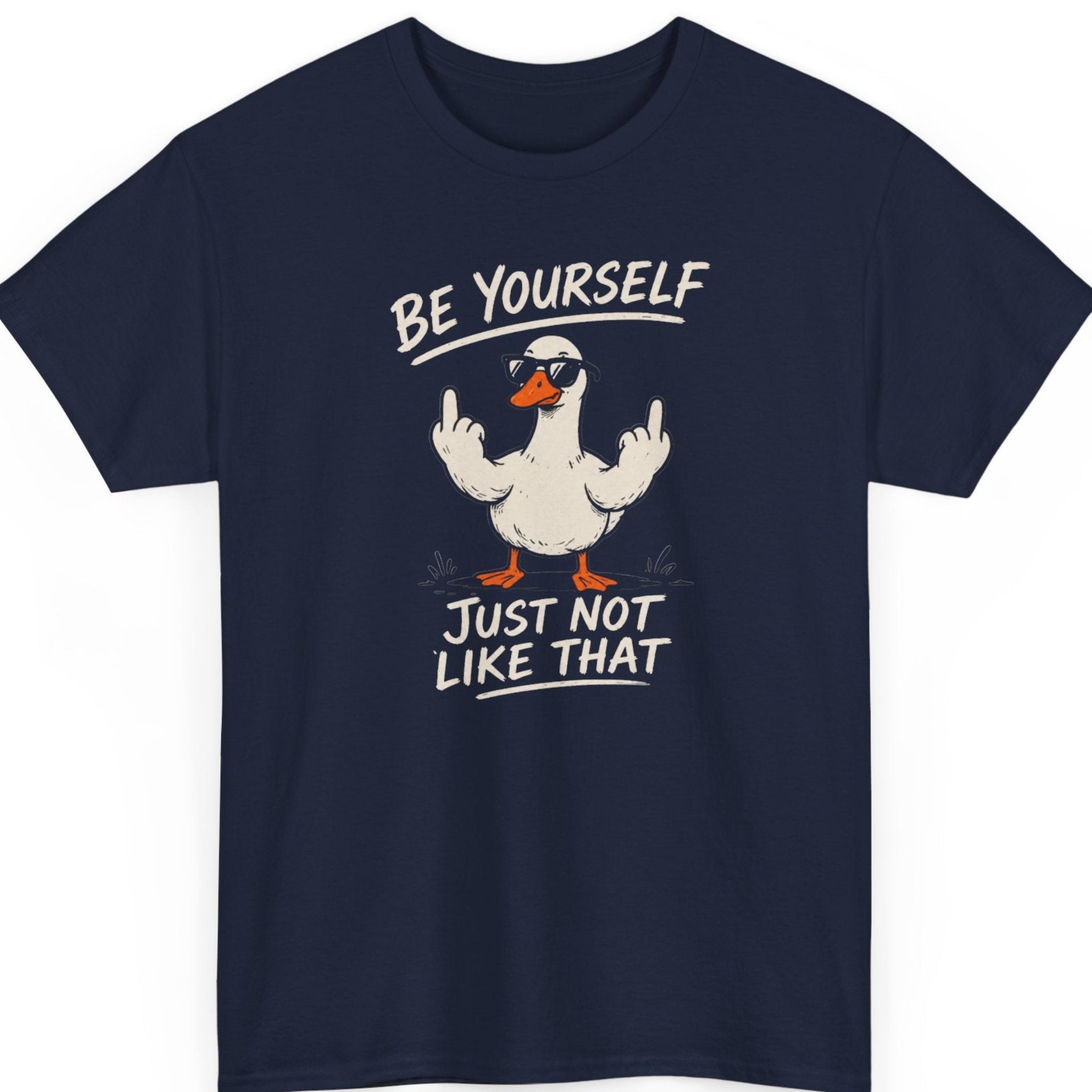 Mayhem Haus sarcastic duck graphic tee on a navy blue shirt featuring a cool duck in sunglasses flipping the bird with cream lettering and orange accents.