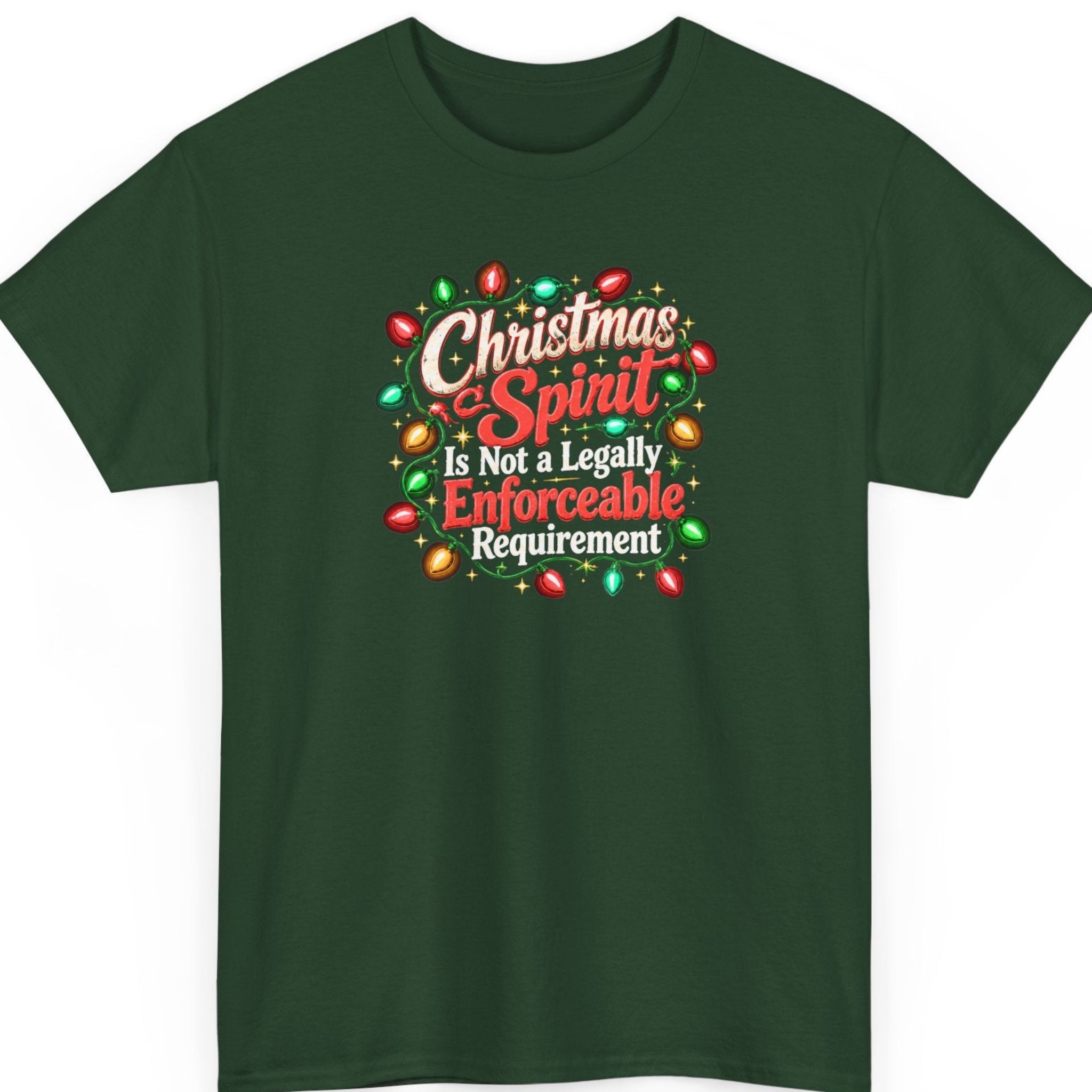 Mayhem Haus “Christmas Spirit Is Not a Legally Enforceable Requirement” forest green t-shirt featuring distressed cream-white and bright red Christmas lettering surrounded by glowing red, green, and golden string lights, decorative gold stars, and ornamental green flourishes.