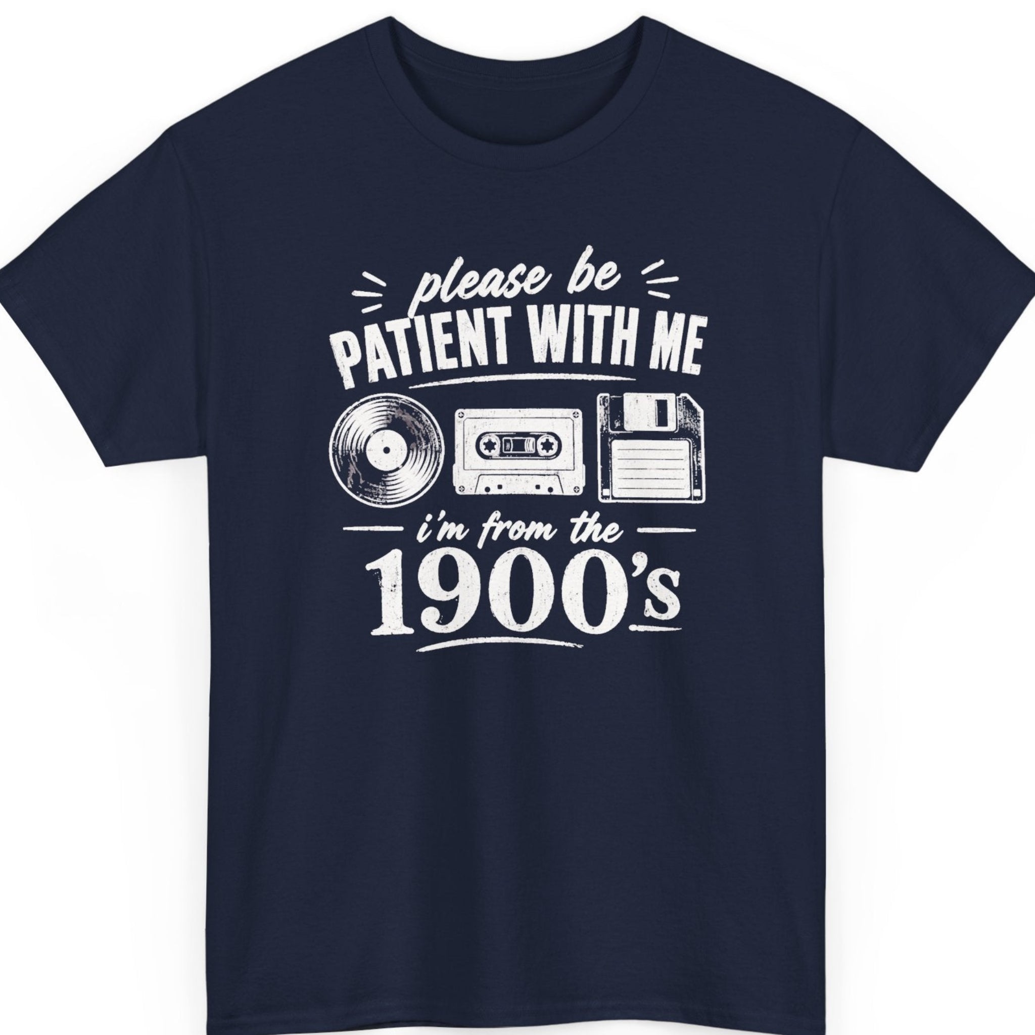 Mayhem Haus retro generation t-shirt on a navy blue tee featuring old-school media icons, including a record, cassette tape, and floppy disk paired with a humorous statement about being from the 1900s.