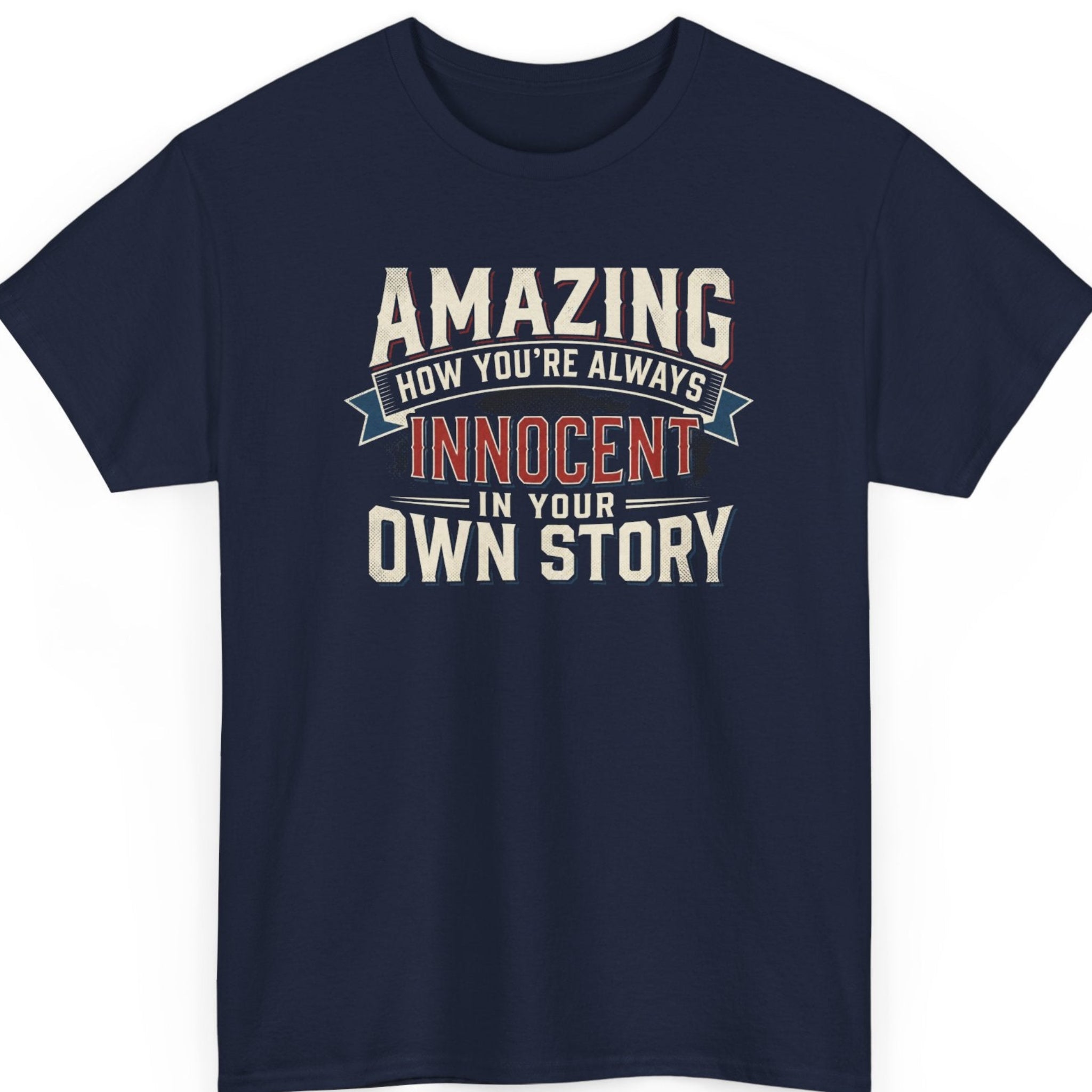 Mayhem Haus sarcastic quote shirt on a navy blue tee featuring distressed cream, red, and blue typography reading "Amazing How You're Always Innocent In Your Own Story."