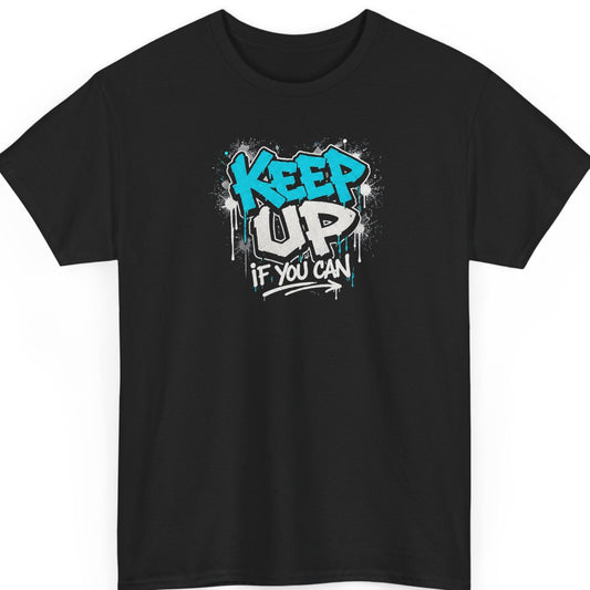 Mayhem Haus graffiti-style graphic t-shirt on a black shirt featuring the phrase "Keep Up If You Can" in bold blue and white street art lettering with paint drips and splatter effects.