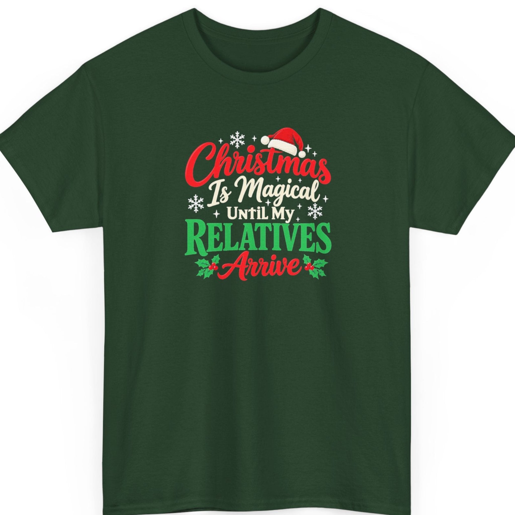 Mayhem Haus “Christmas Is Magical Until My Relatives Arrive” forest green t-shirt featuring red, cream, and green holiday lettering with a Santa hat, scattered snowflakes, and holly berries surrounding a sarcastic Christmas family quote.