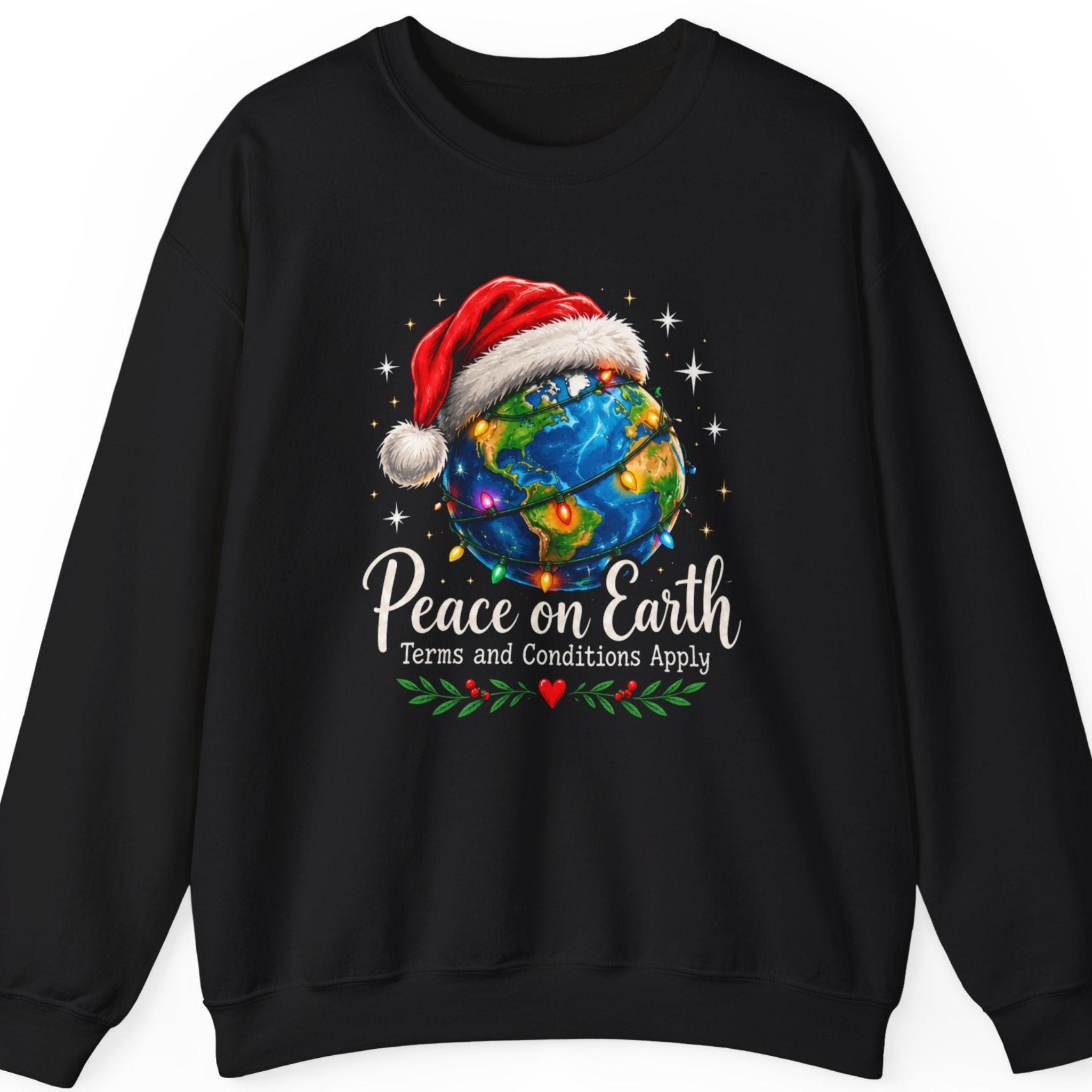 Mayhem Haus “Peace on Earth Terms and Conditions Apply” black sweatshirt featuring a vibrant blue and green globe wearing a red Santa hat and decorated with colorful Christmas lights. Sparkling stars surround the Earth, while cream-colored script typography displays the humorous holiday message above green foliage, red berries, and a small red heart.