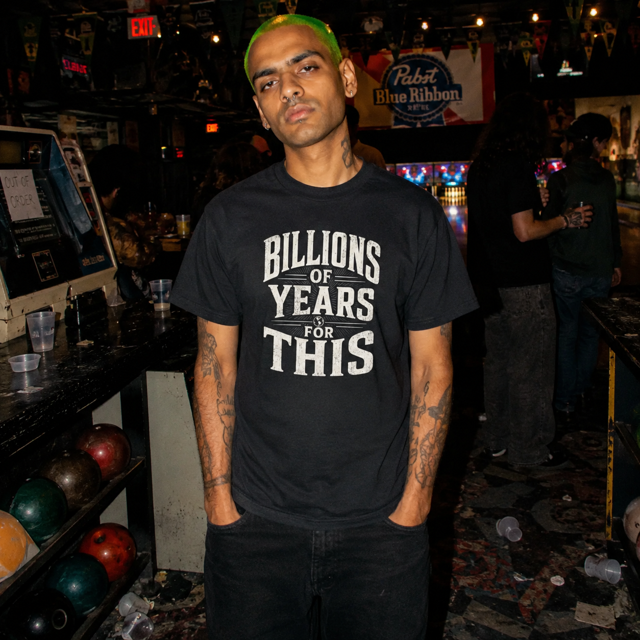 Mayhem Haus Billions of Years for This T-Shirt in black with white text, worn by a person with green hair
