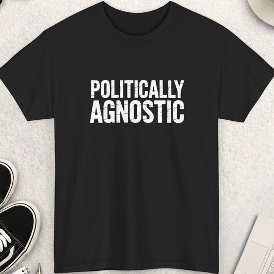 Black t-shirt with 'POLITICALLY AGNOSTIC' text on a light gray surface with accessories.