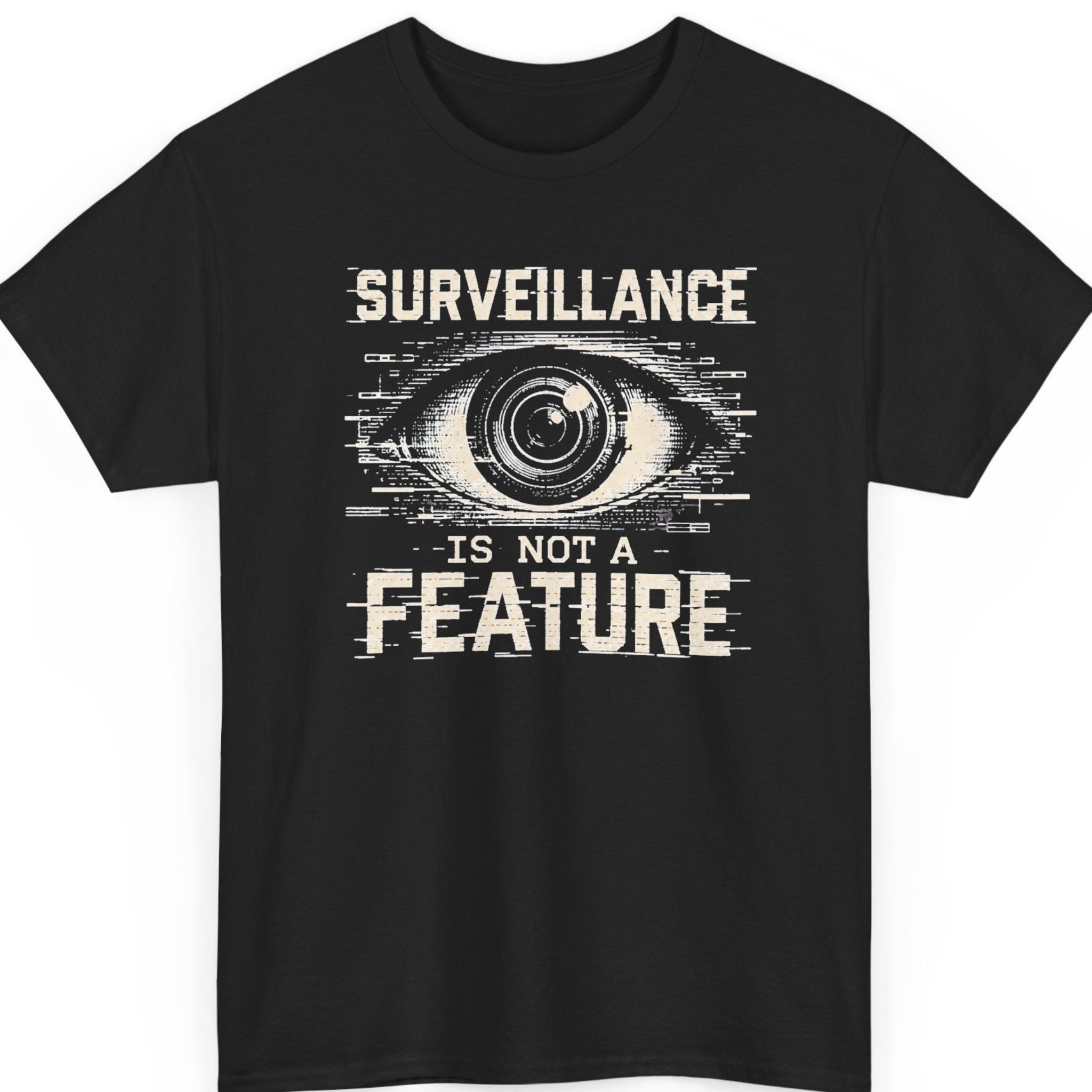 Mayhem Haus “Surveillance Is Not a Feature” black t-shirt featuring a distressed all-seeing eye graphic with digital glitch effects and bold off-white typography.