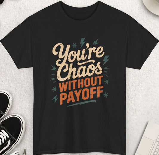 Black t-shirt with 'You're Chaos Without Payoff' text on a light gray surface with shoes, coffee, and accessories.