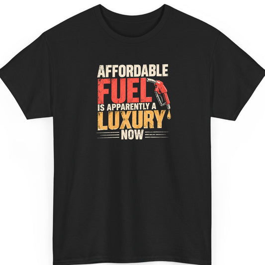 Mayhem Haus “Affordable Fuel Is Apparently a Luxury Now” black t-shirt featuring distressed cream, red, and orange typography with a vintage gas pump nozzle graphic.