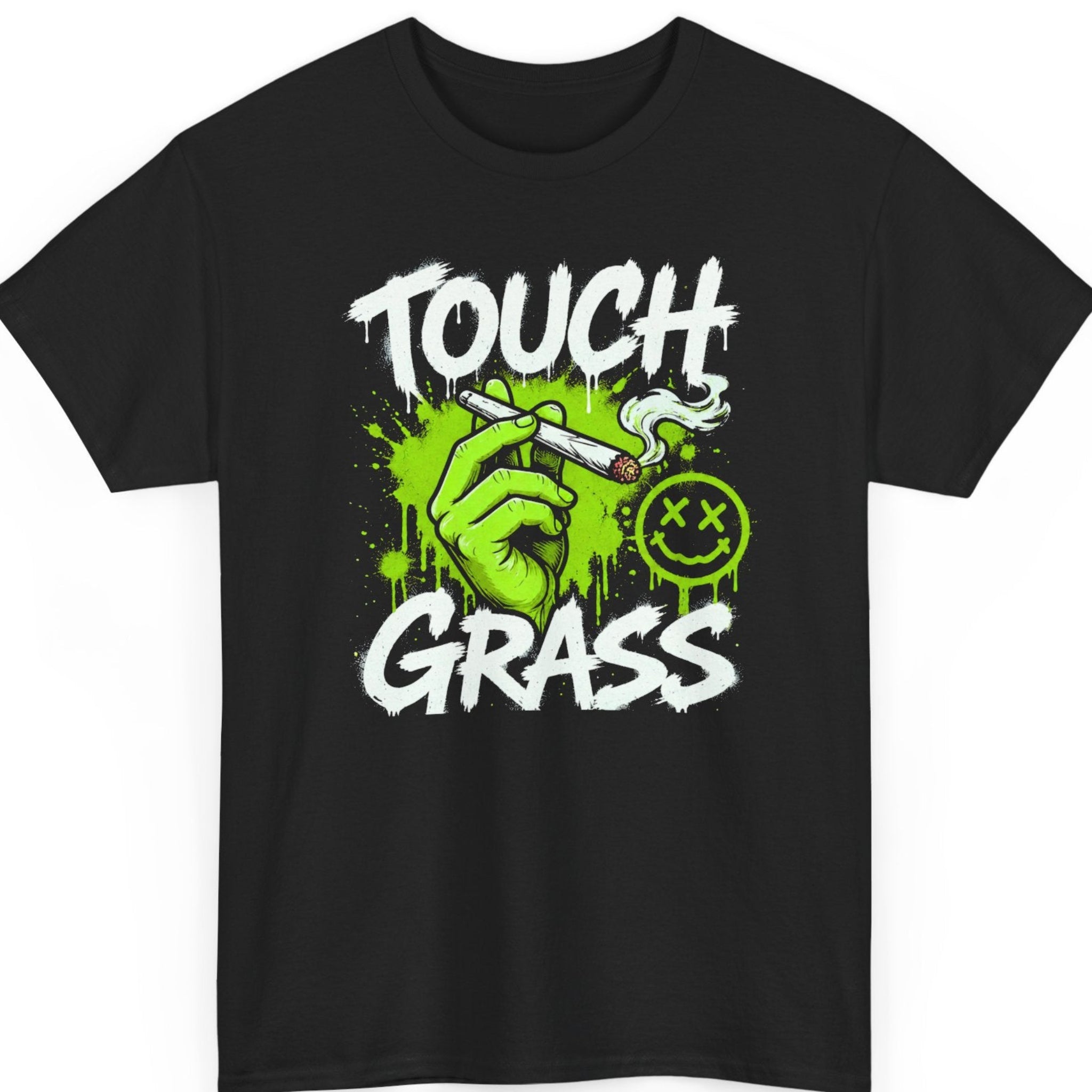 Mayhem Haus funny cannabis graphic t-shirt on a black shirt featuring a bright green hand holding a lit joint with graffiti-style white typography reading "Touch Grass" and a neon smiley face.