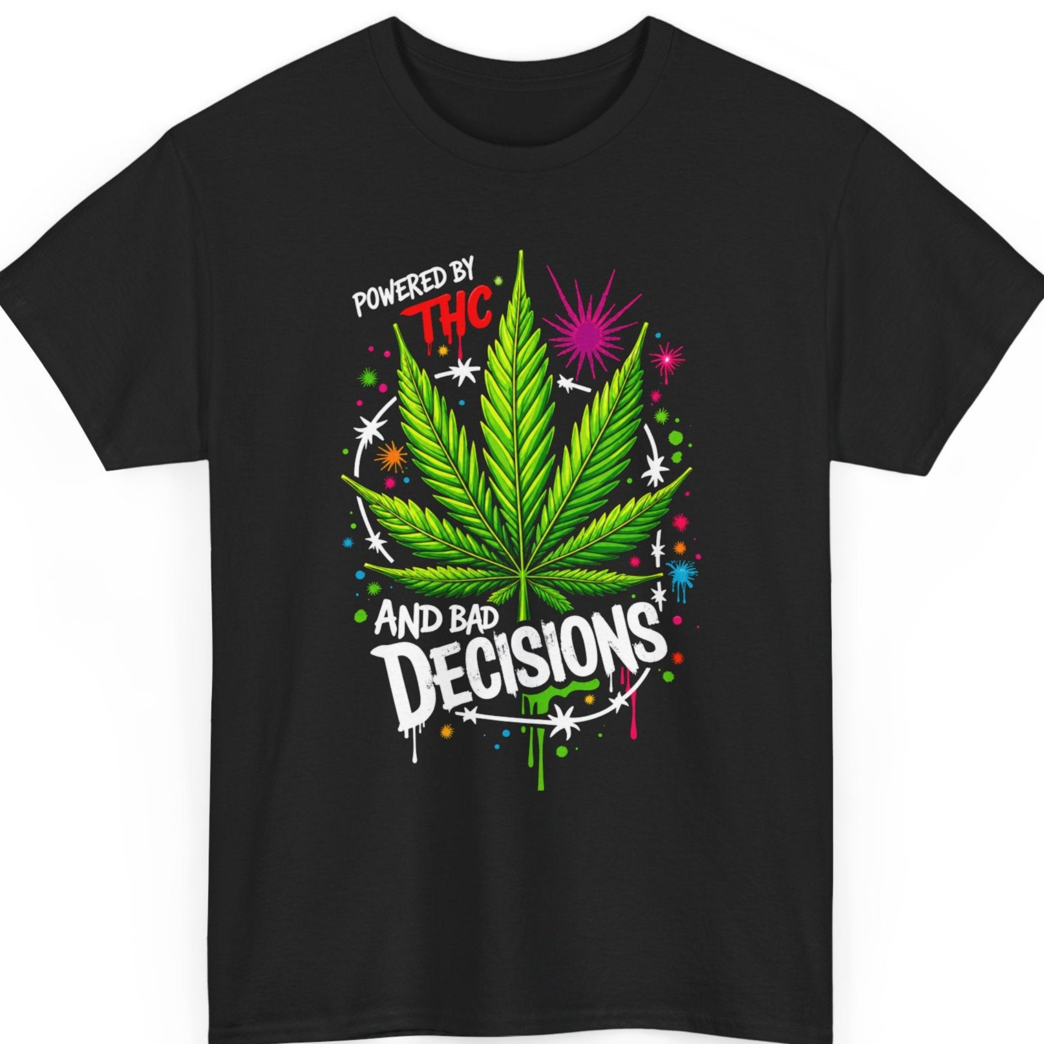 Mayhem Haus cannabis graphic t-shirt on a black shirt featuring a vibrant marijuana leaf surrounded by colorful splatter artwork with the funny quote "Powered By THC And Bad Decisions."
