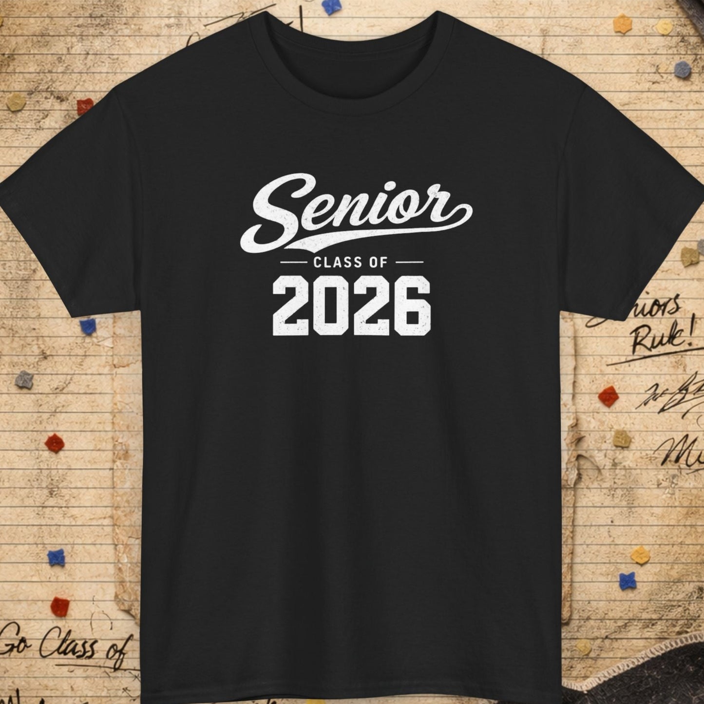 Black t-shirt with 'Senior Class of 2026' text on a textured background with confetti and signatures.