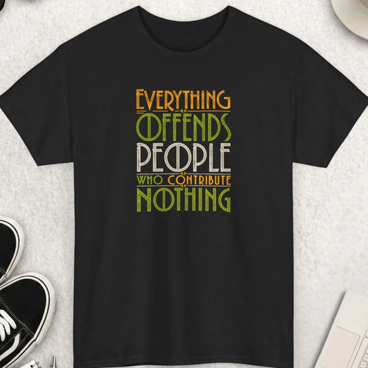 Black vintage typography graphic t-shirt featuring the phrase “Everything Offends People Who Contribute Nothing” in distressed green, gold, and cream retro lettering with a bold statement aesthetic.
