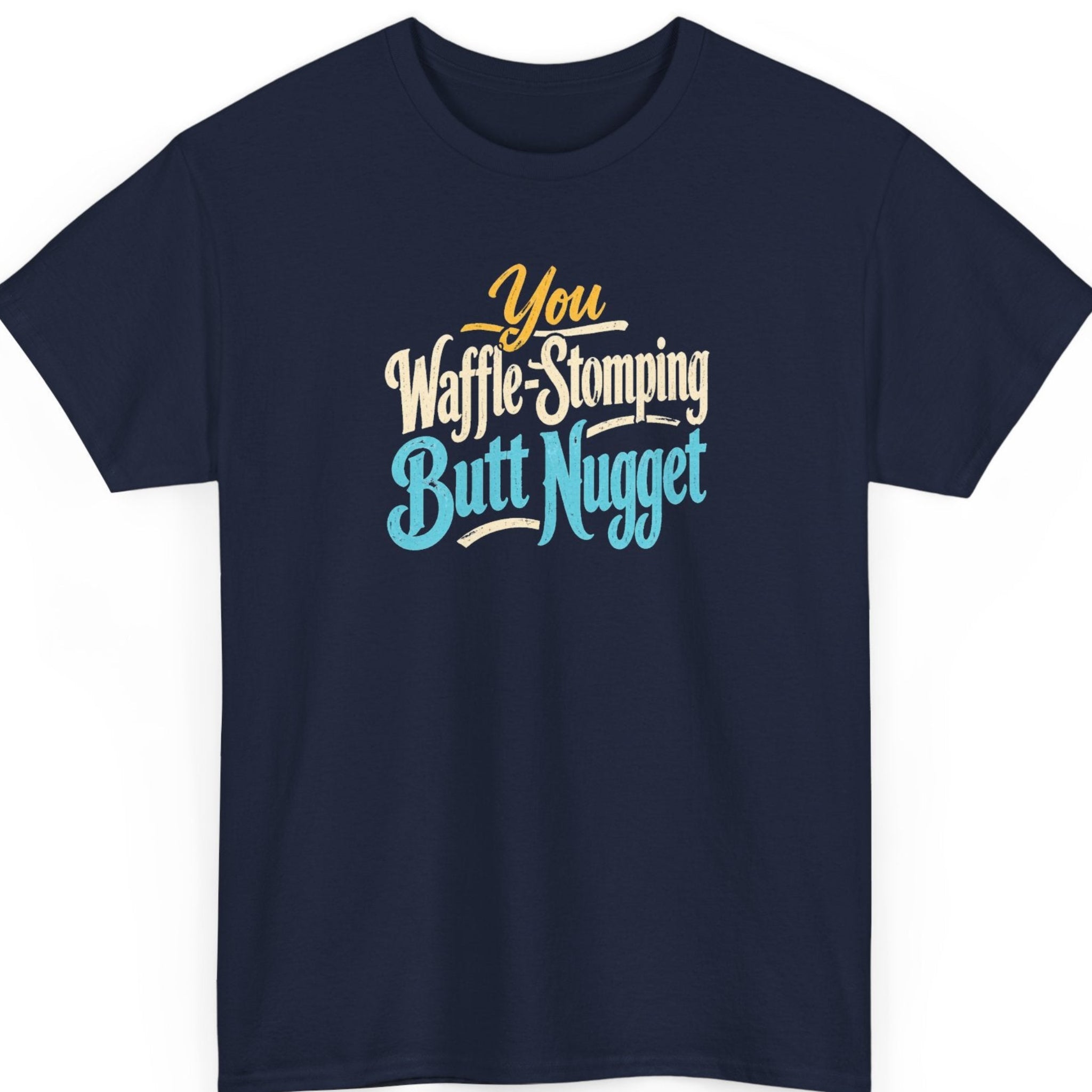 Mayhem Haus “You Waffle-Stomping Butt Nugget” navy blue t-shirt featuring distressed golden yellow, cream, and turquoise lettering in a bold retro typography design.