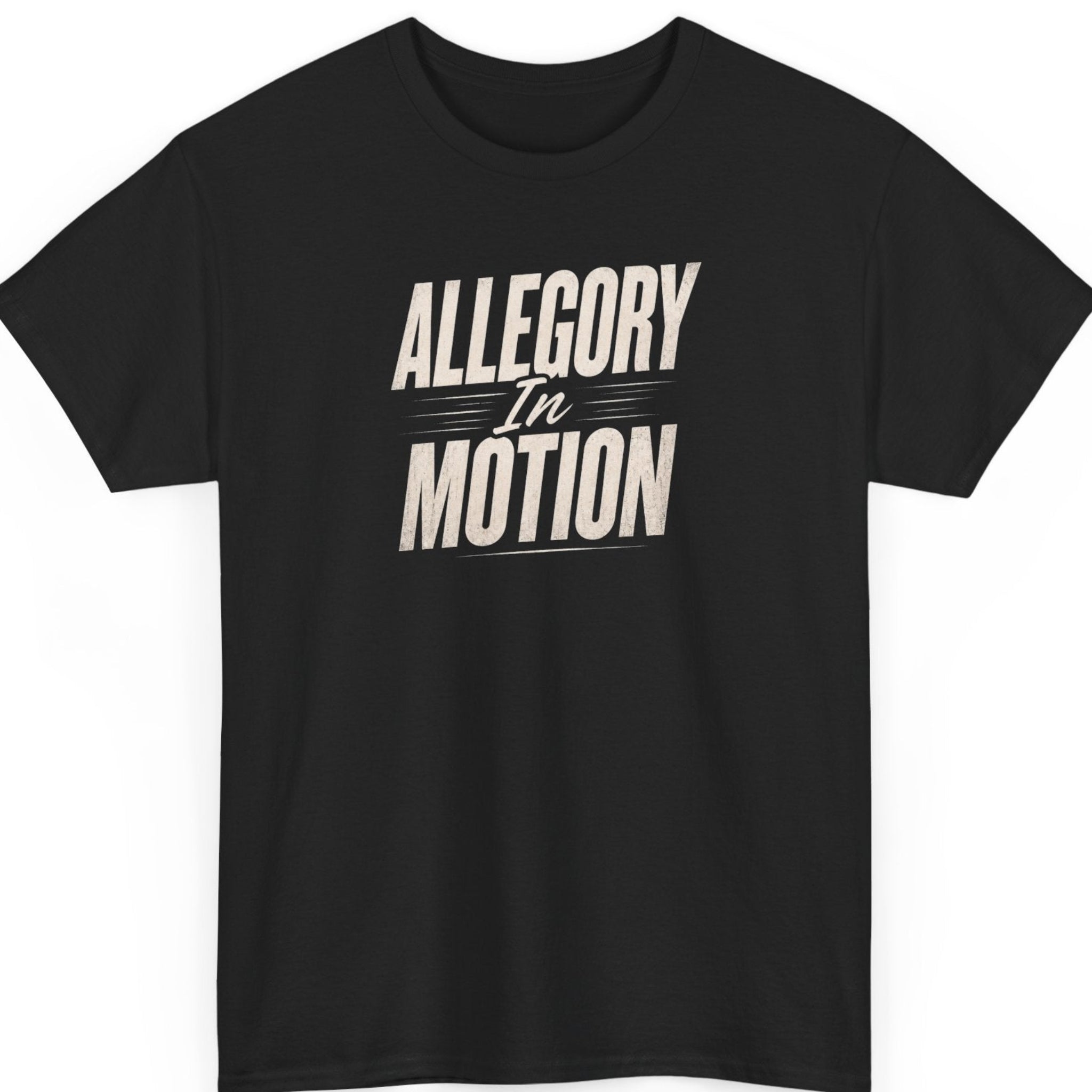 Mayhem Haus "Allegory In Motion" graphic t-shirt on a black shirt featuring distressed cream typography with an italic script "In" and subtle motion line accents in a bold stacked layout.
