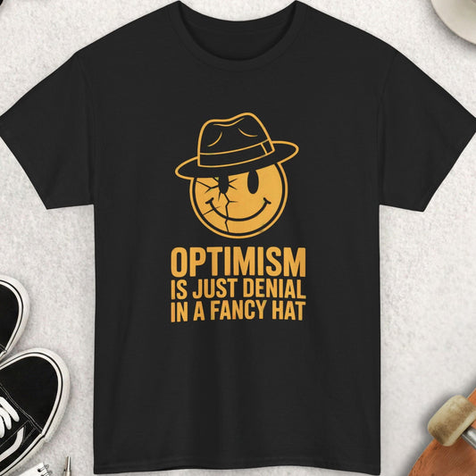 Black t-shirt with yellow graphic and text on a light gray surface with accessories.