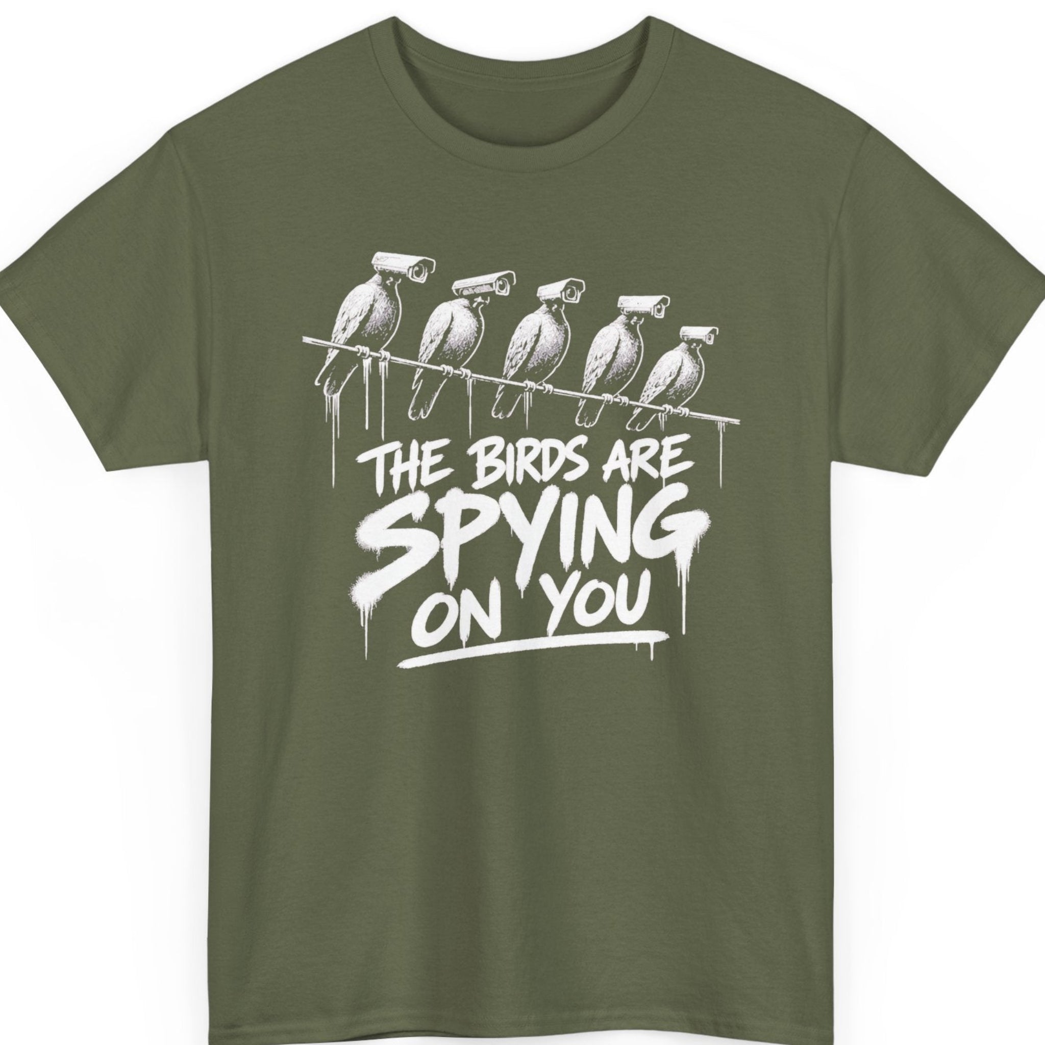 Mayhem Haus parody conspiracy shirt on a military green t-shirt featuring vintage-style birds transformed into security cameras paired with a humorous government surveillance-inspired design.