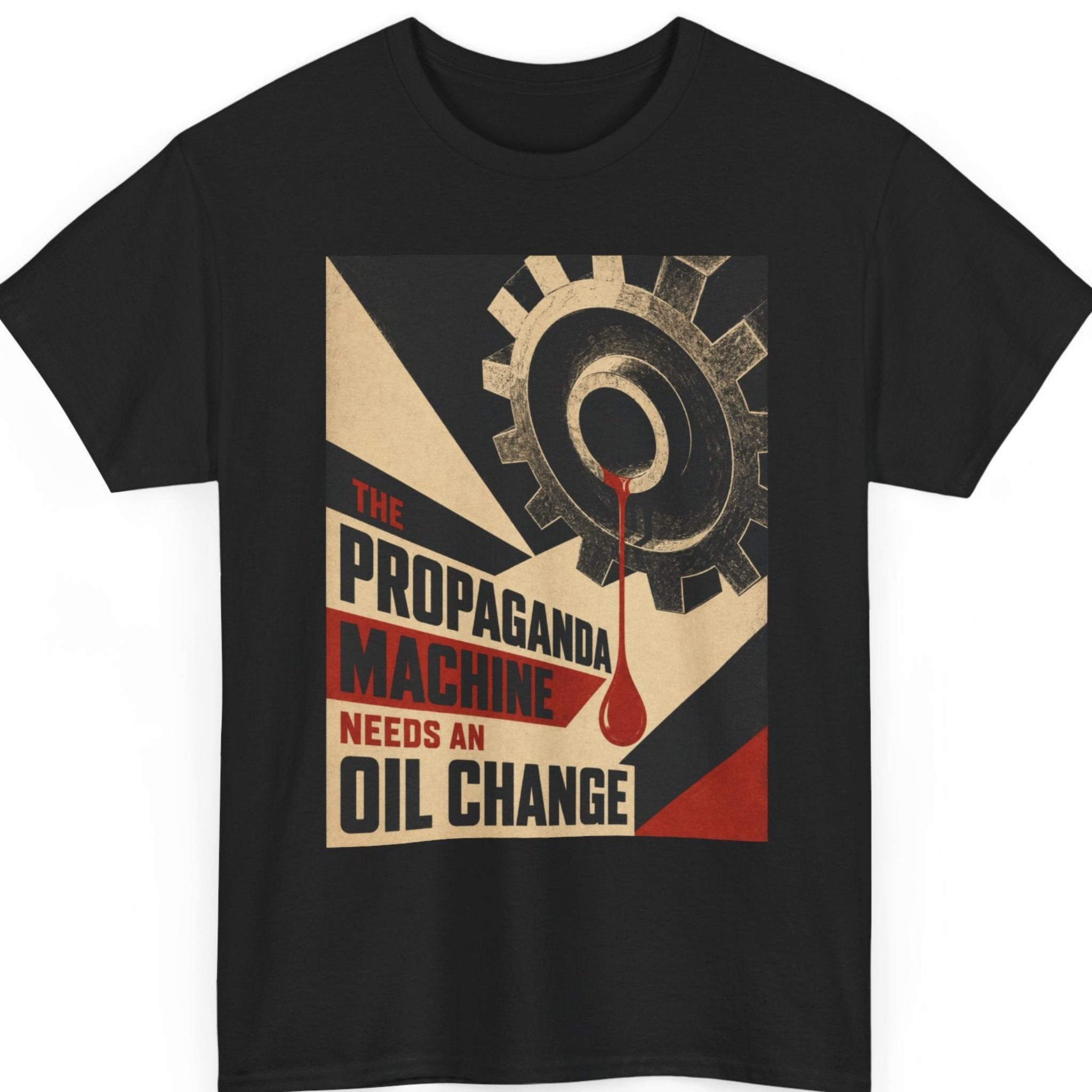 Mayhem Haus propaganda-themed graphic t-shirt on a black shirt featuring a distressed vintage poster design with a large industrial gear dripping red oil above bold typography reading "The Propaganda Machine Needs An Oil Change" in a retro constructivist style.