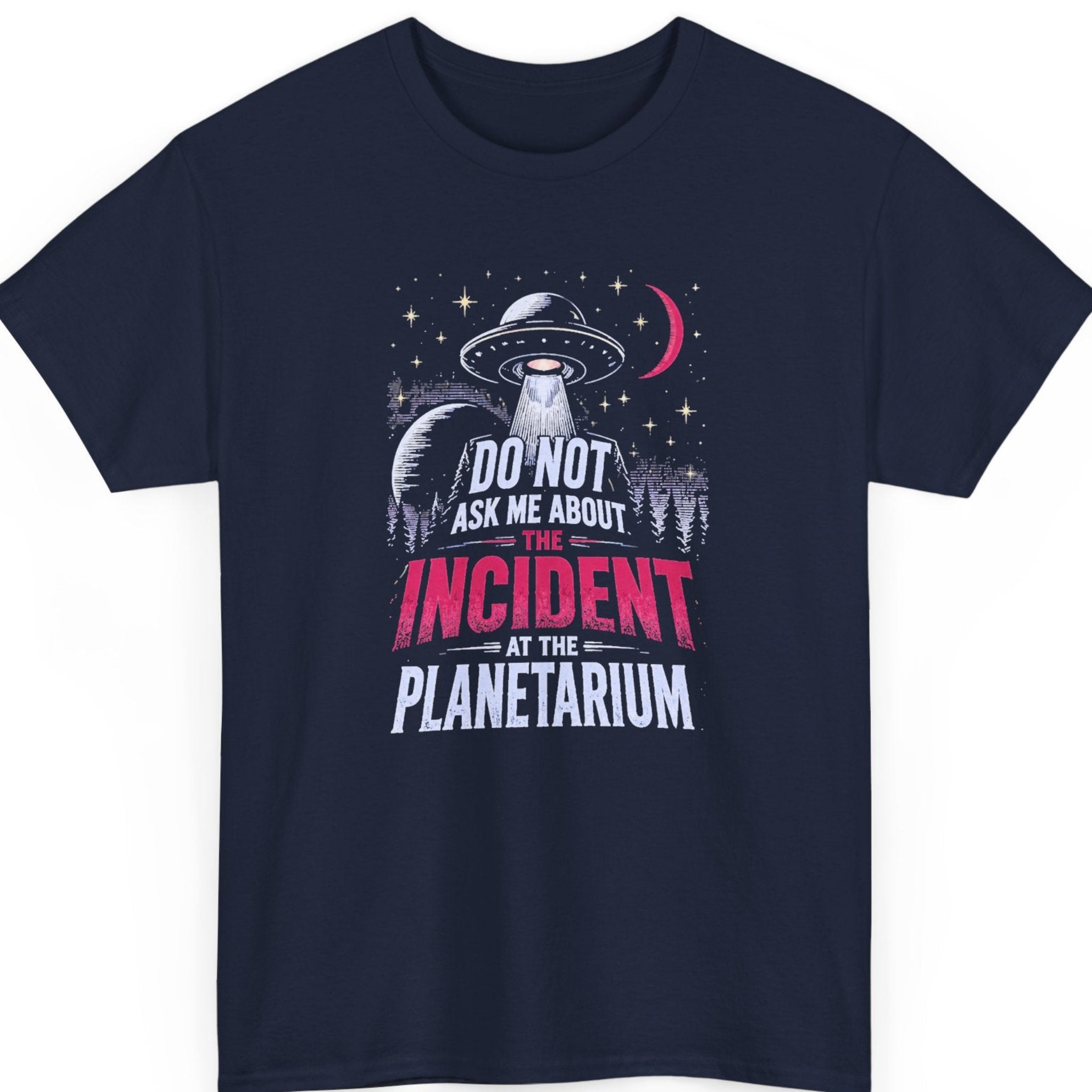 Mayhem Haus funny planetarium t-shirt on a navy blue tee featuring a retro flying saucer hovering over a nighttime forest with bold distressed typography that reads, "Do Not Ask Me About the Incident at the Planetarium."