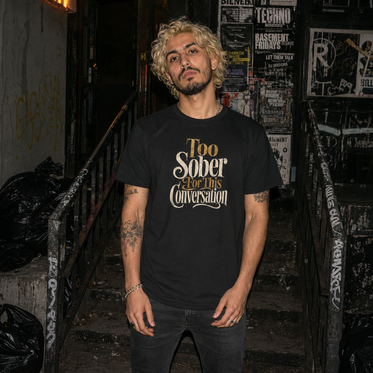 Mayhem Haus Too Sober For This Conversation T-Shirt on a person with blonde hair and tattoos