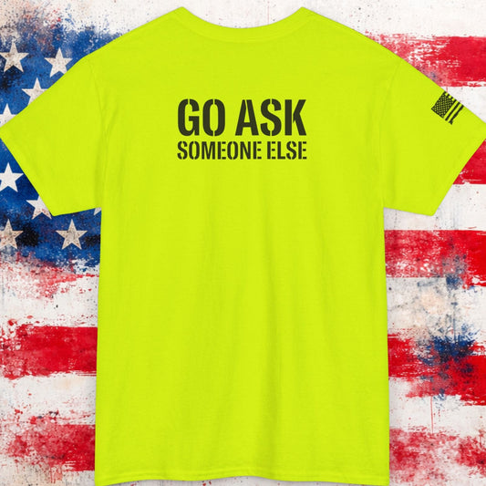 Yellow t-shirt with text 'GO ASK SOMEONE ELSE' on a distressed American flag background