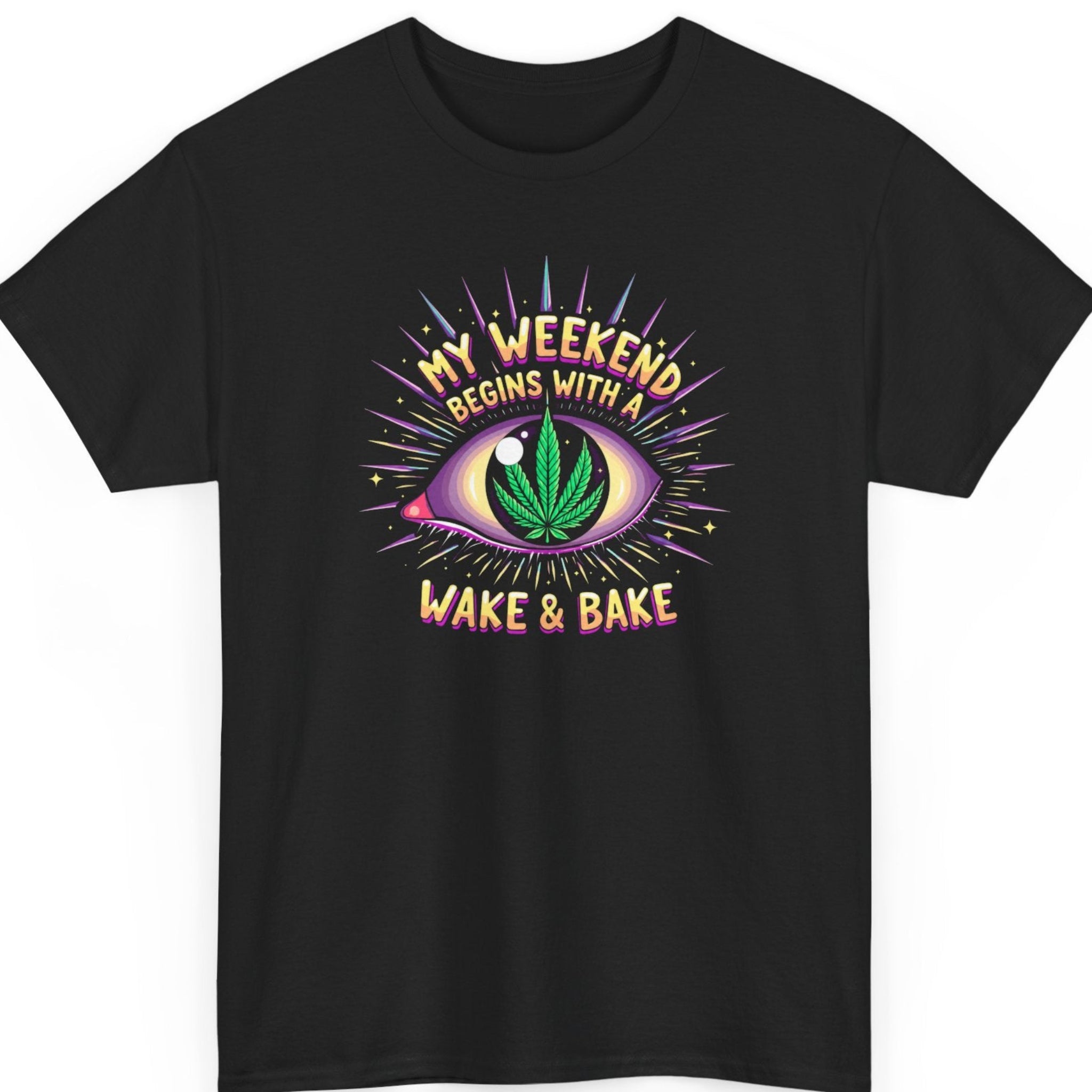 Mayhem Haus cannabis graphic t-shirt on a black shirt featuring a psychedelic eye with a marijuana leaf iris and the colorful phrase "My Weekend Begins With A Wake & Bake."
