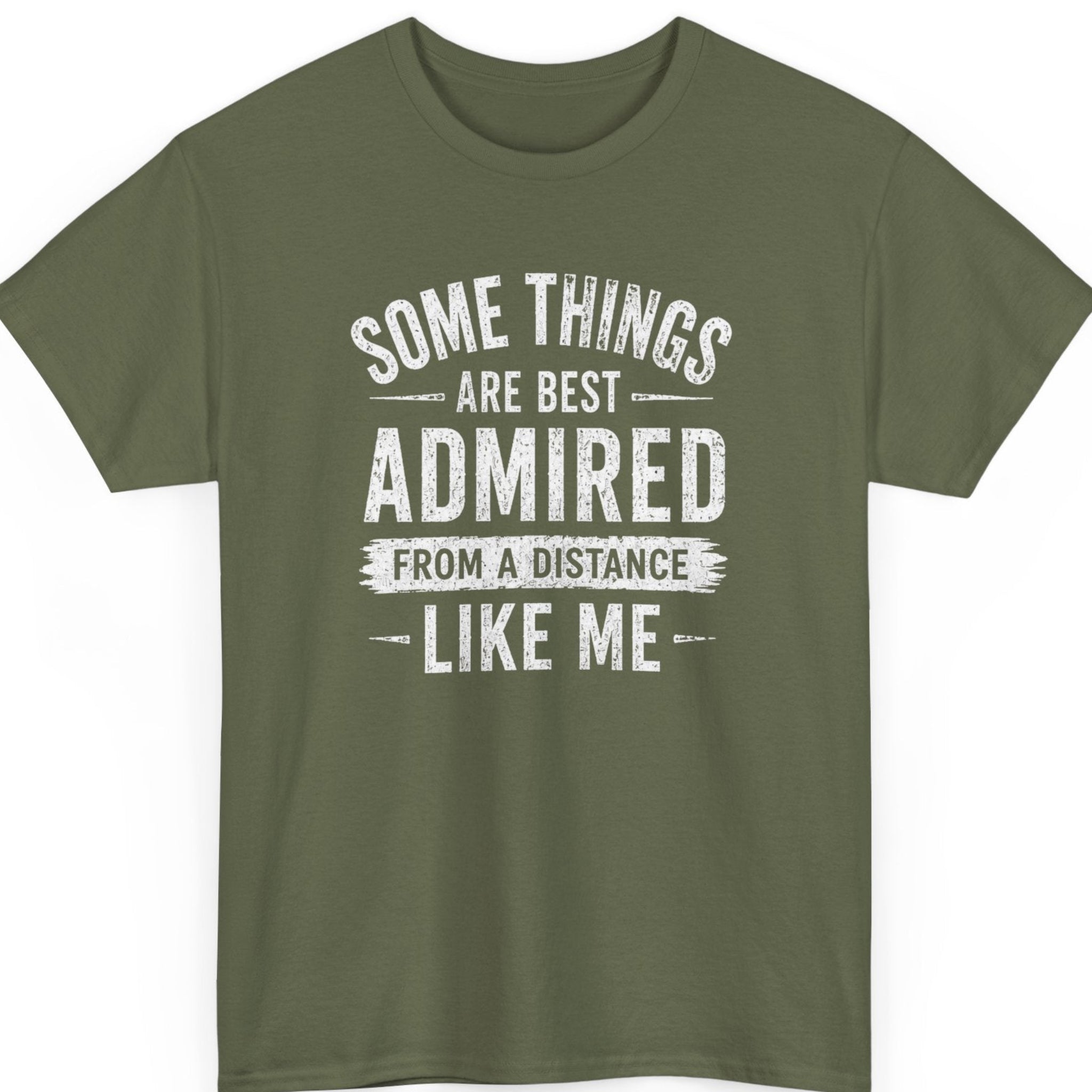 Mayhem Haus Sarcastic introvert graphic t-shirt with "Some Things Are Best Admired From a Distance Like Me" quote on military green shirt