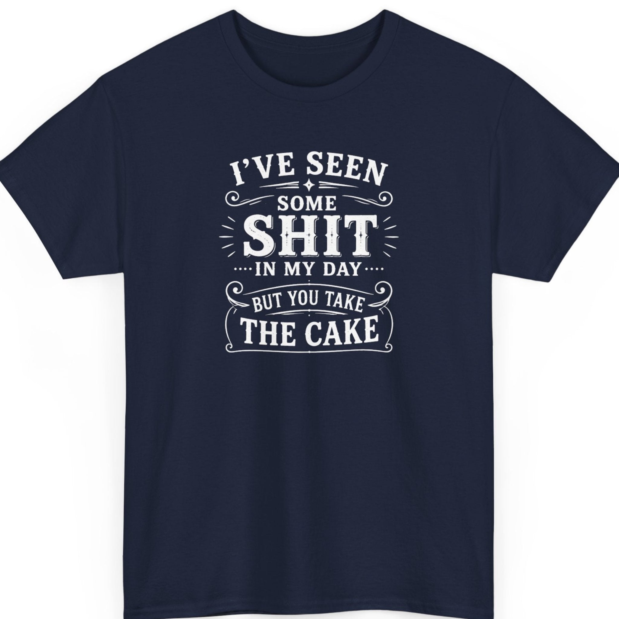 Mayhem Haus funny quote t-shirt on a navy blue shirt featuring bold white distressed typography reading "I've Seen Some Shit In My Day... But You Take The Cake" in an eye-catching vintage layout.