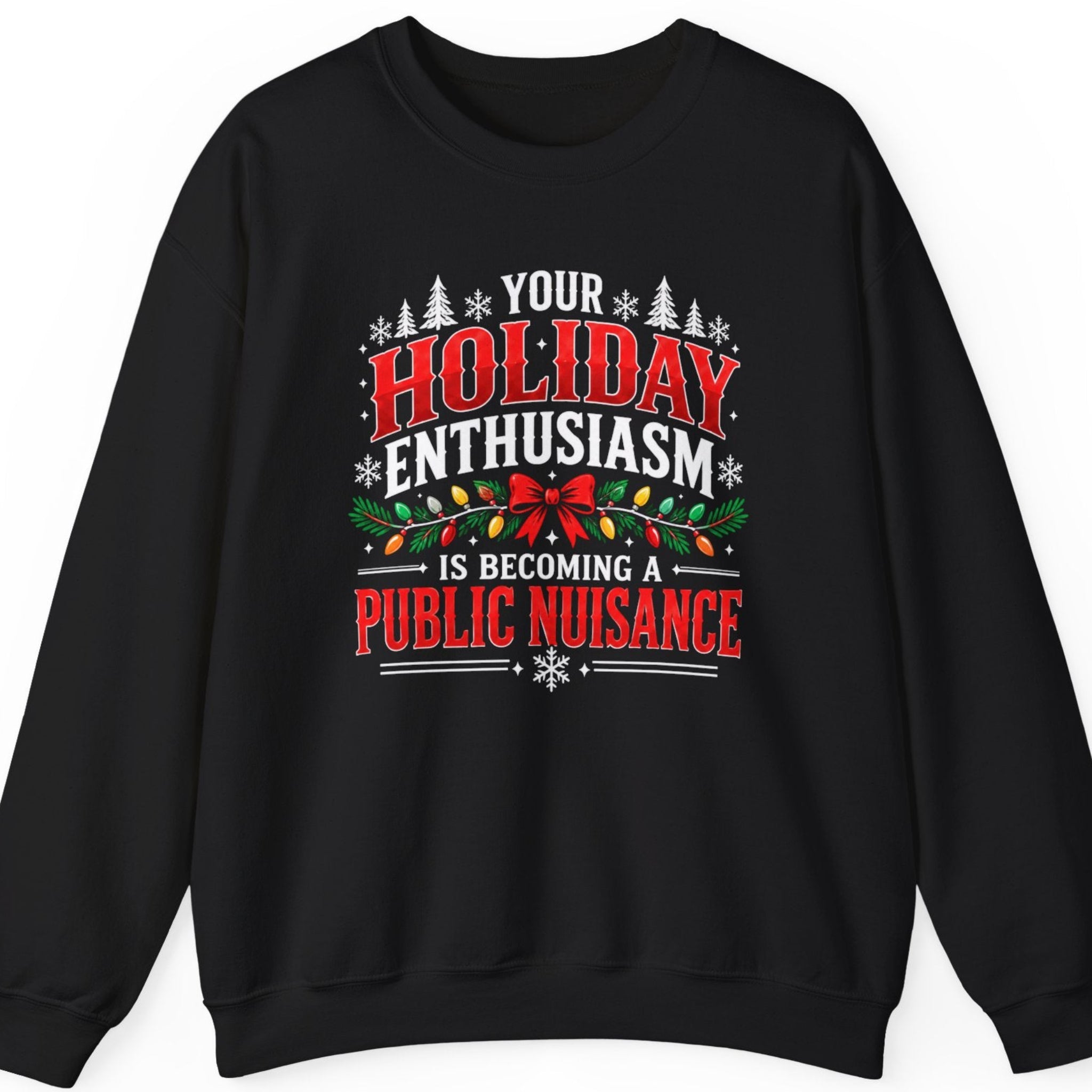 Mayhem Haus “Your Holiday Enthusiasm Is Becoming a Public Nuisance” black crewneck sweatshirt featuring vintage-inspired red and white Christmas lettering, evergreen garlands with multicolored holiday lights, a decorative red bow, snowflakes, and pine tree accents.